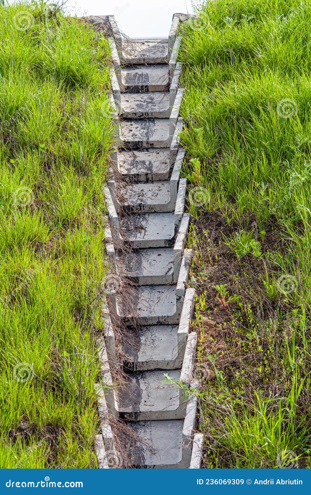 Concrete Road Drainage Trays. Storm Gutter in the Slope of the Road