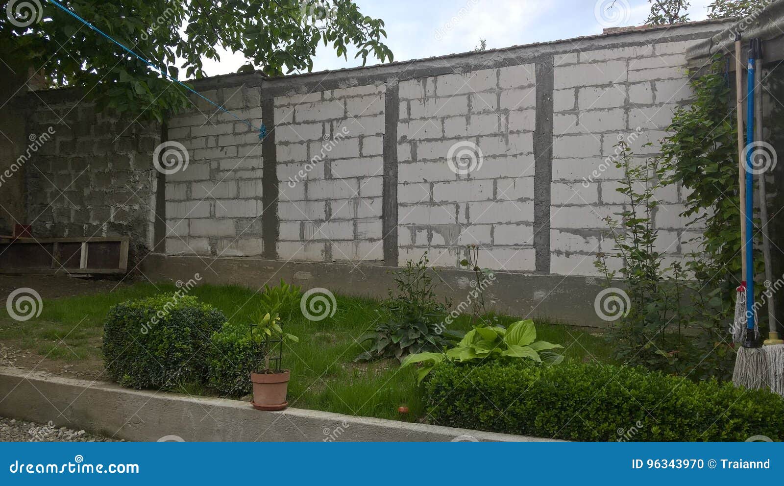 Concrete wall with bricks stock photo. Image of nearby 96343970