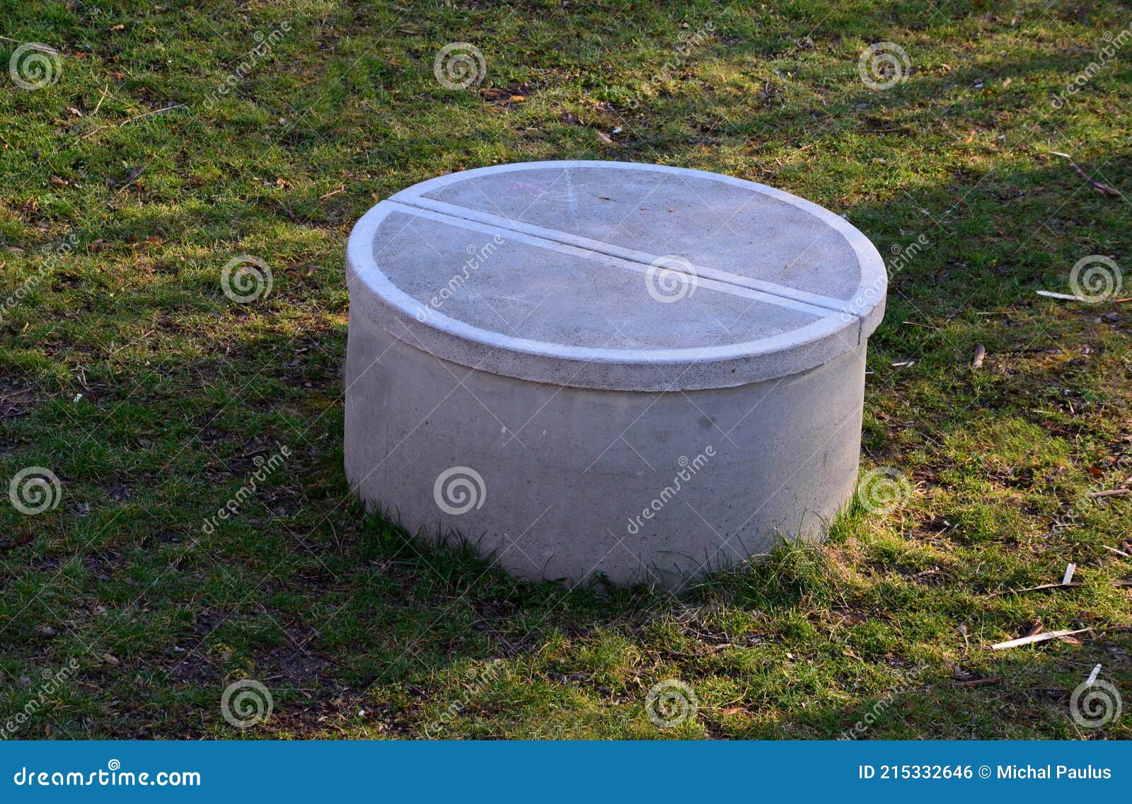Concrete Well of the Well Covered with a Round Concrete Lid. the Hatch