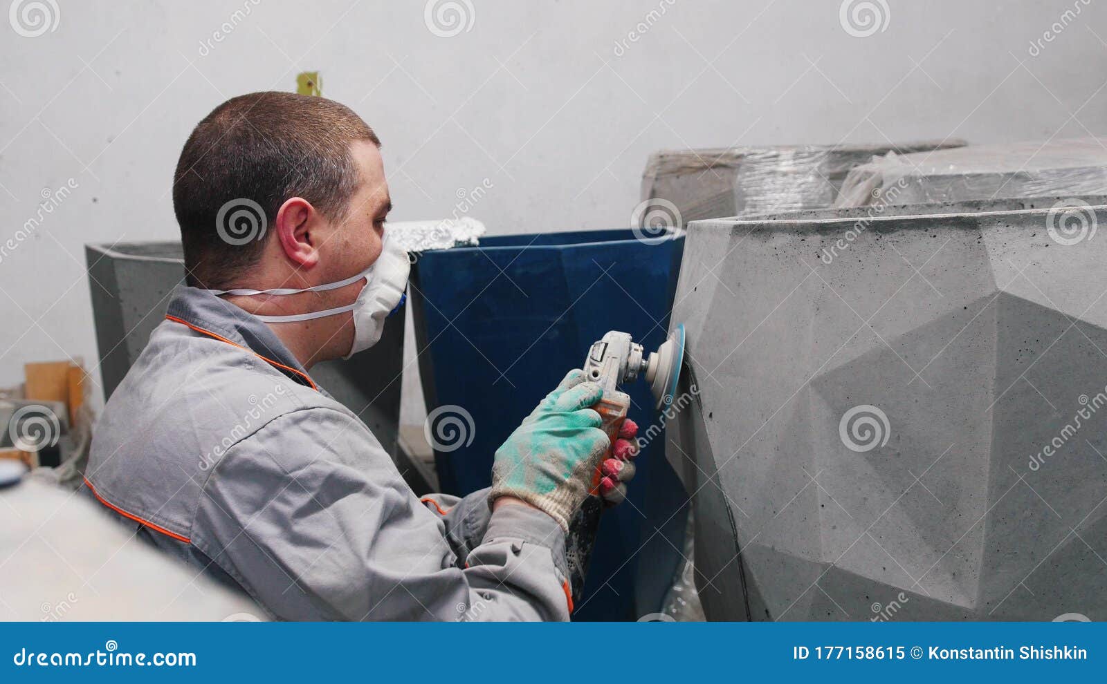 Concrete Master Grinding Concrete Product in a Respirator