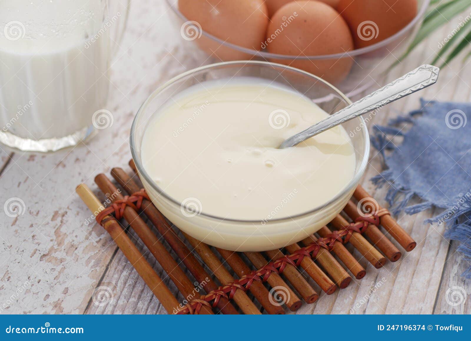Condensed Milk in a Bowl Close Up, Stock Photo Image of creamy, blue