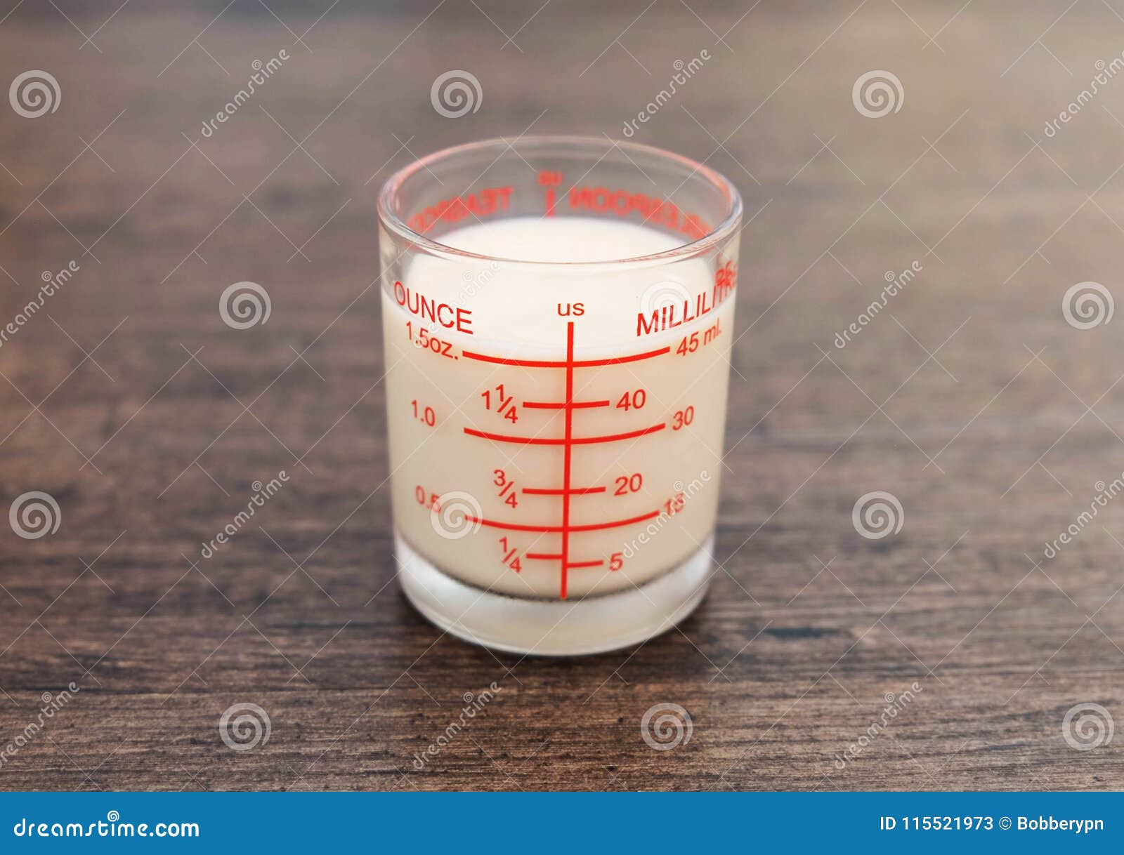 Condensed Milk in a Measuring Cup Stock Image Image of cream, drip
