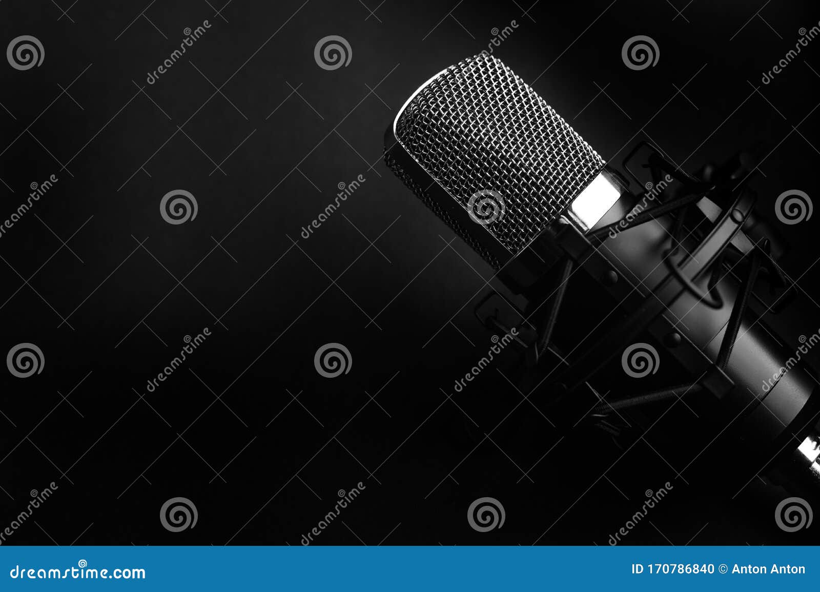 condenser black studio microphone on a black background. streamer, podcasts, music background