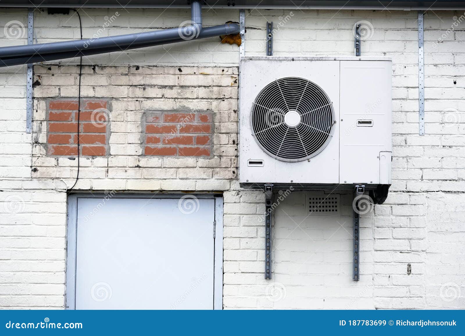 Condenser Unit for Air Conditioning System Wall Mounted Outdoors Stock Image Image of building