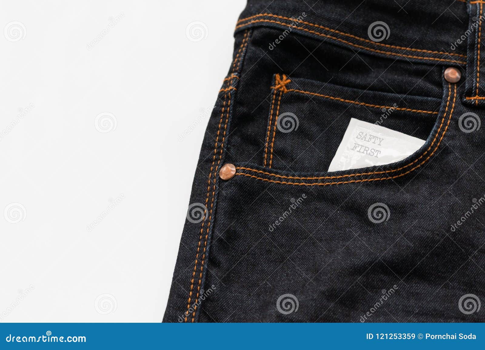 condom in the jeans pocket with word safty first