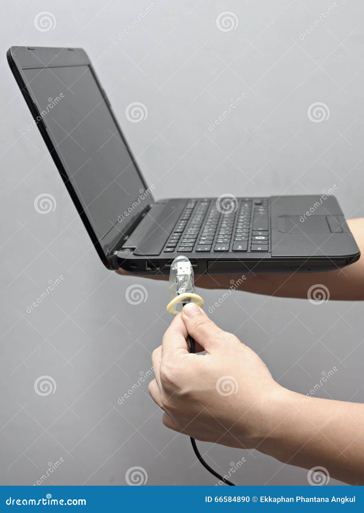 Condom on USB cable stock photo. Image of data, lock 66584890