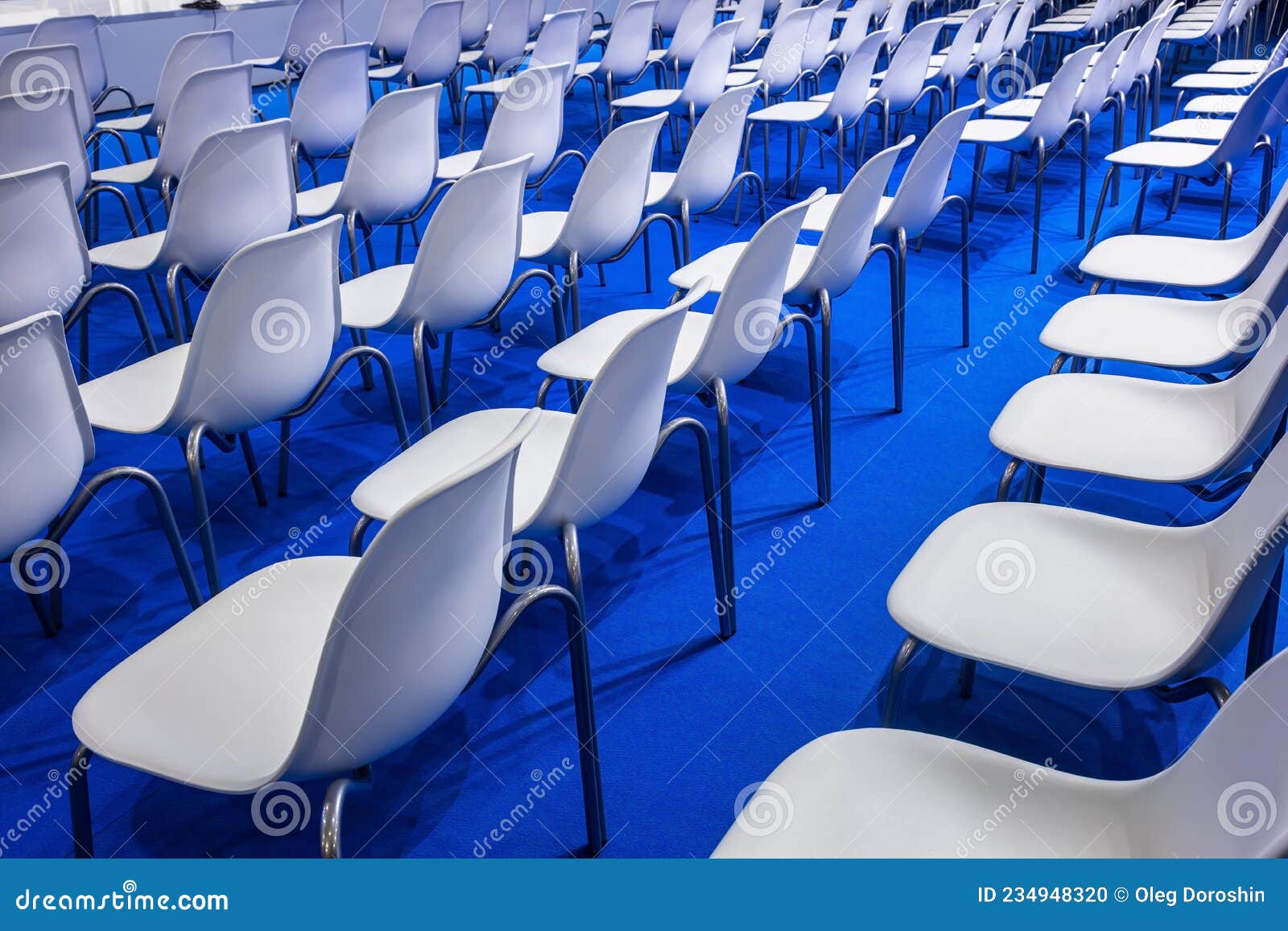 Conference Hall, a Row of White Chairs for Business Meetings Stock