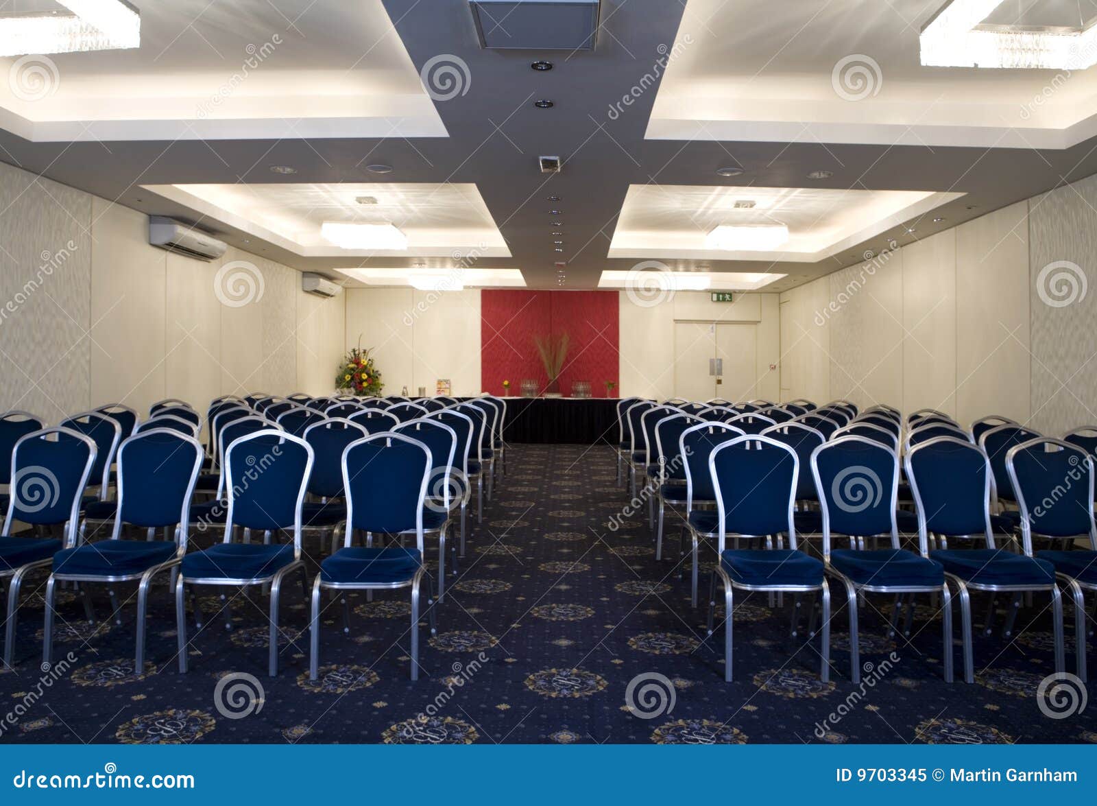 Conference room. A conference and meeting room with chairs and tables.