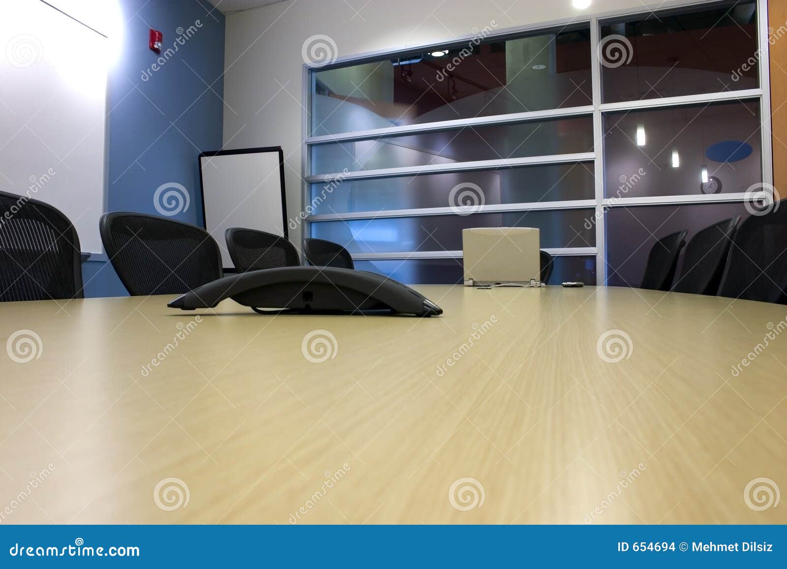 Conference Room with a Laptop and a PDA on the Table Stock Photo