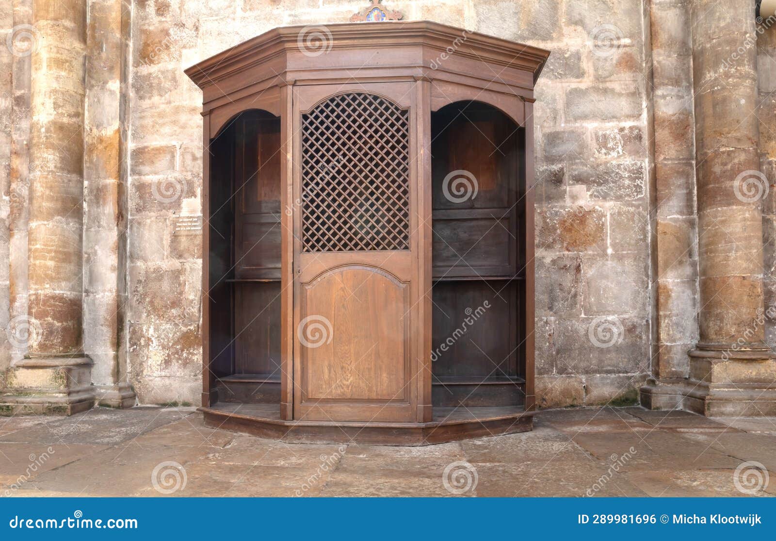 confessional box or booth, a wooden cabinet or stall where the priest presides over confession