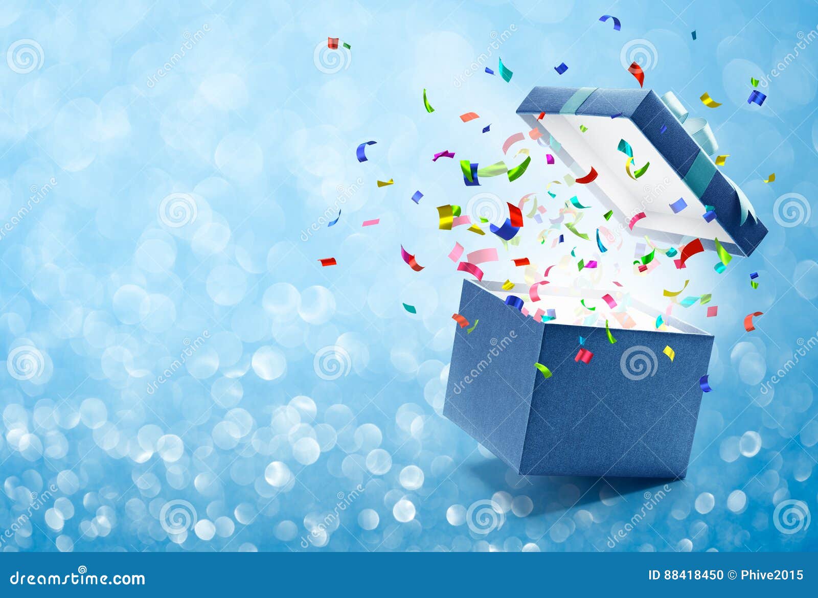 confetti popping out from blue gift box