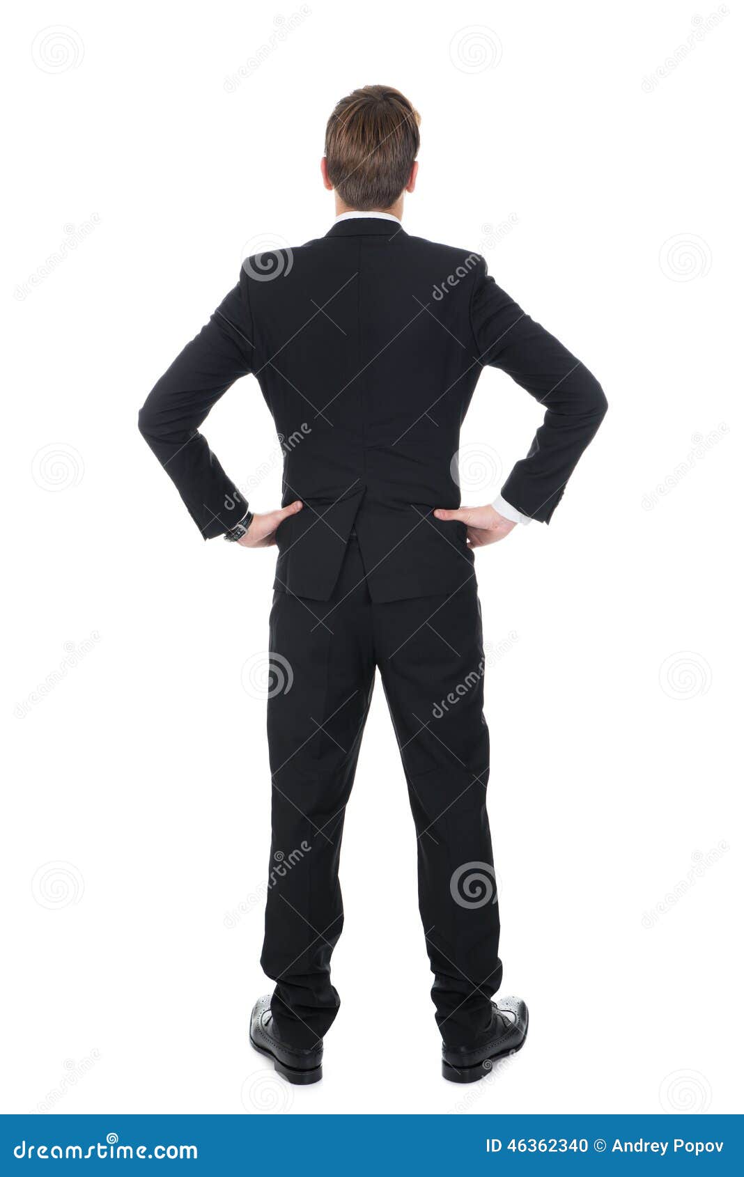 Confident Businessman Standing with Hands on Hips Stock Photo - Image ...