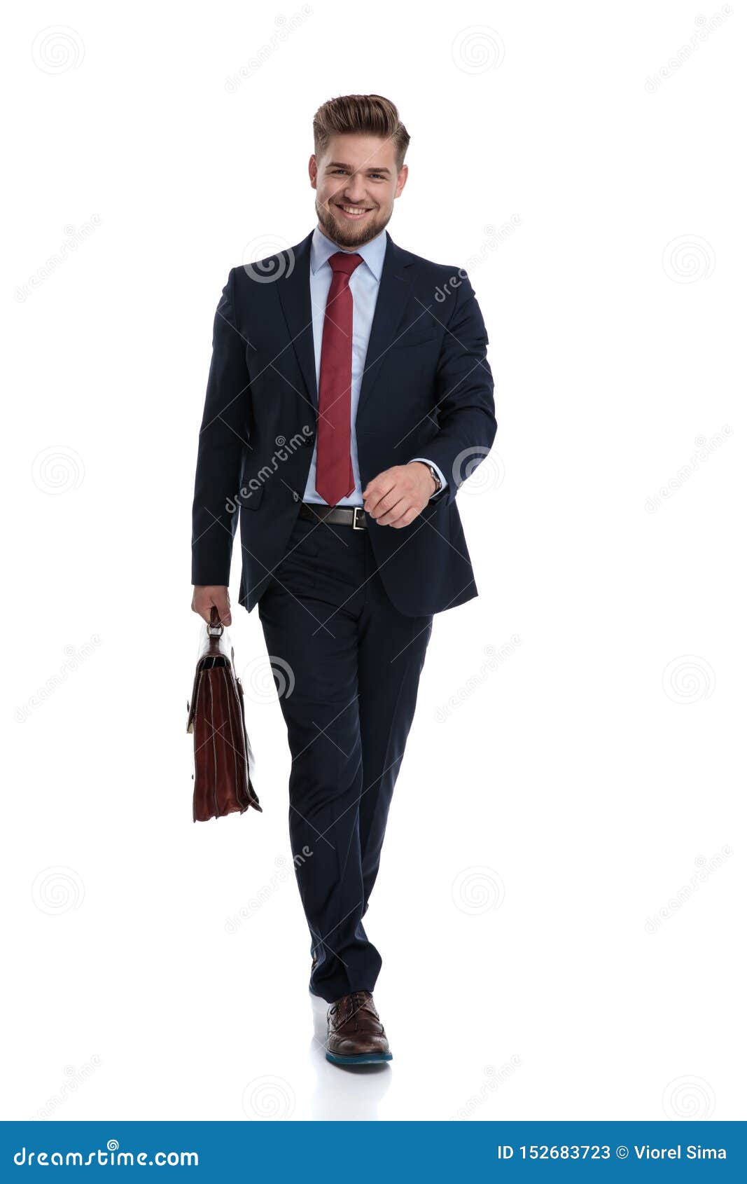 confident-businessman-walking-his-briefcase-confident-businessman-walking-his-briefcase-smiling-wearing-blue-152683723.jpg