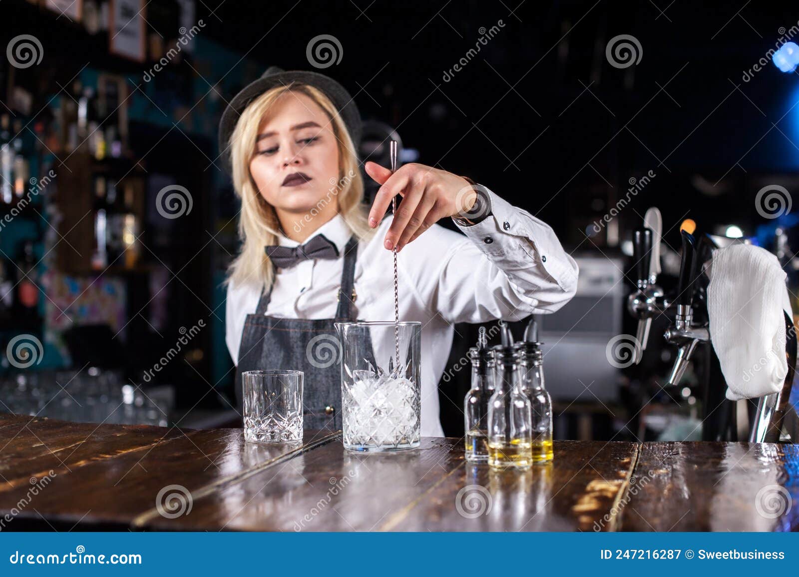 Portrait of Girl Bartender Makes a Cocktail on the Bar Stock Image ...
