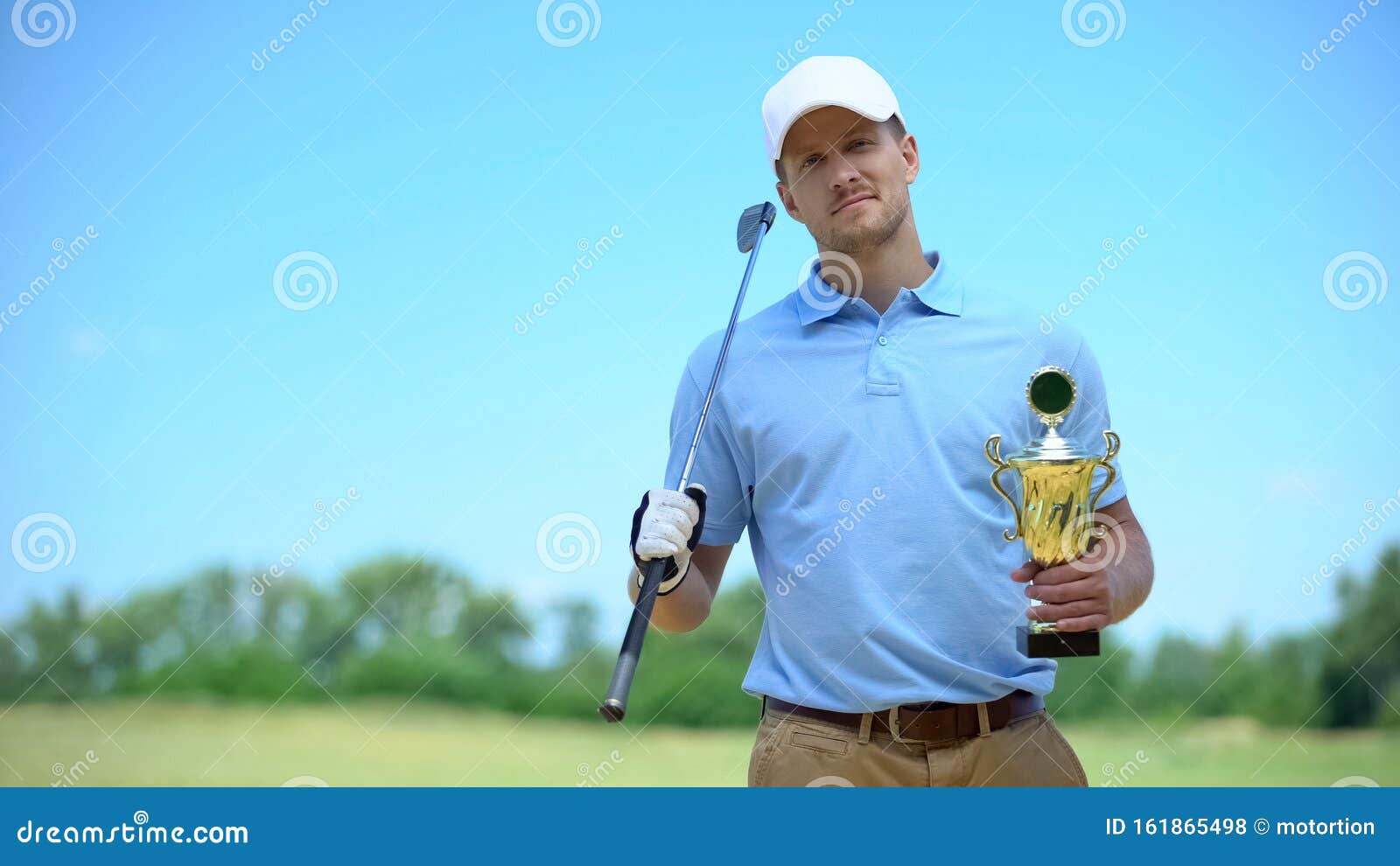 Confident Golf Player with Gold Cup and Club Smiling on Camera, Sport ...