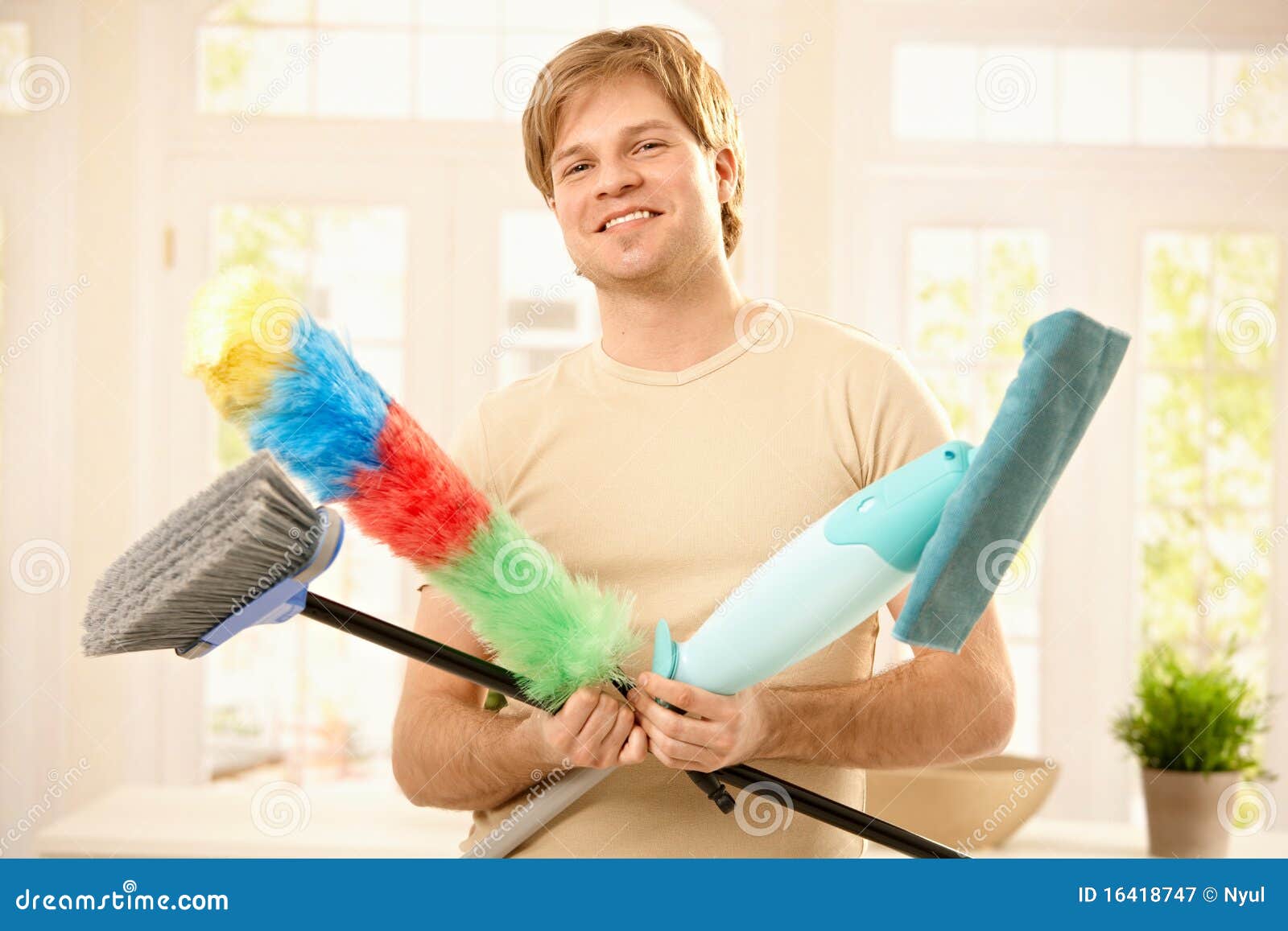 Confident Guy with Cleaning Tools Stock Image Image of daylight