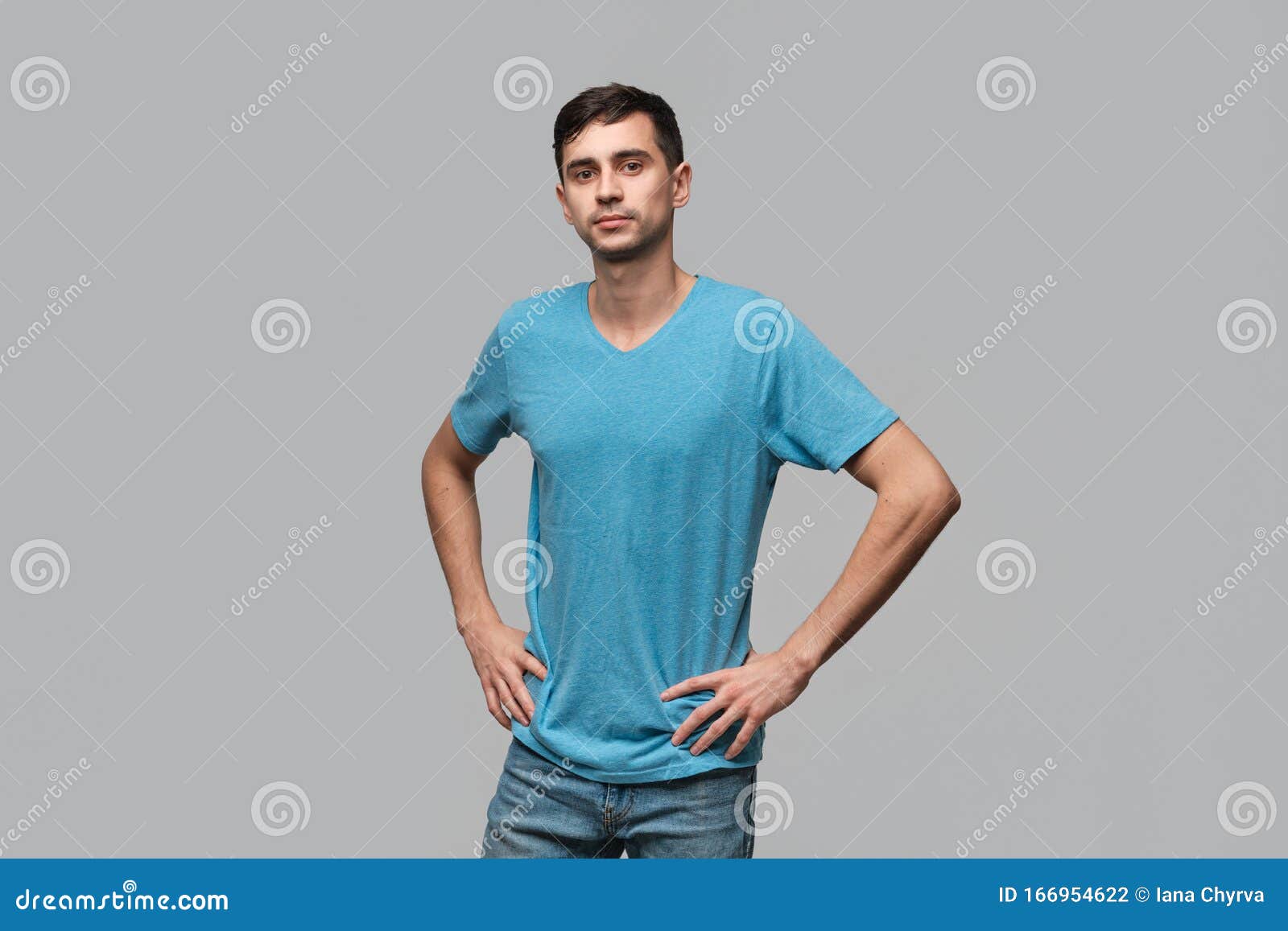 Confident Man in a Blue Tee Lookning at the Camera. Concept of Confidence Stock Photo - Image of
