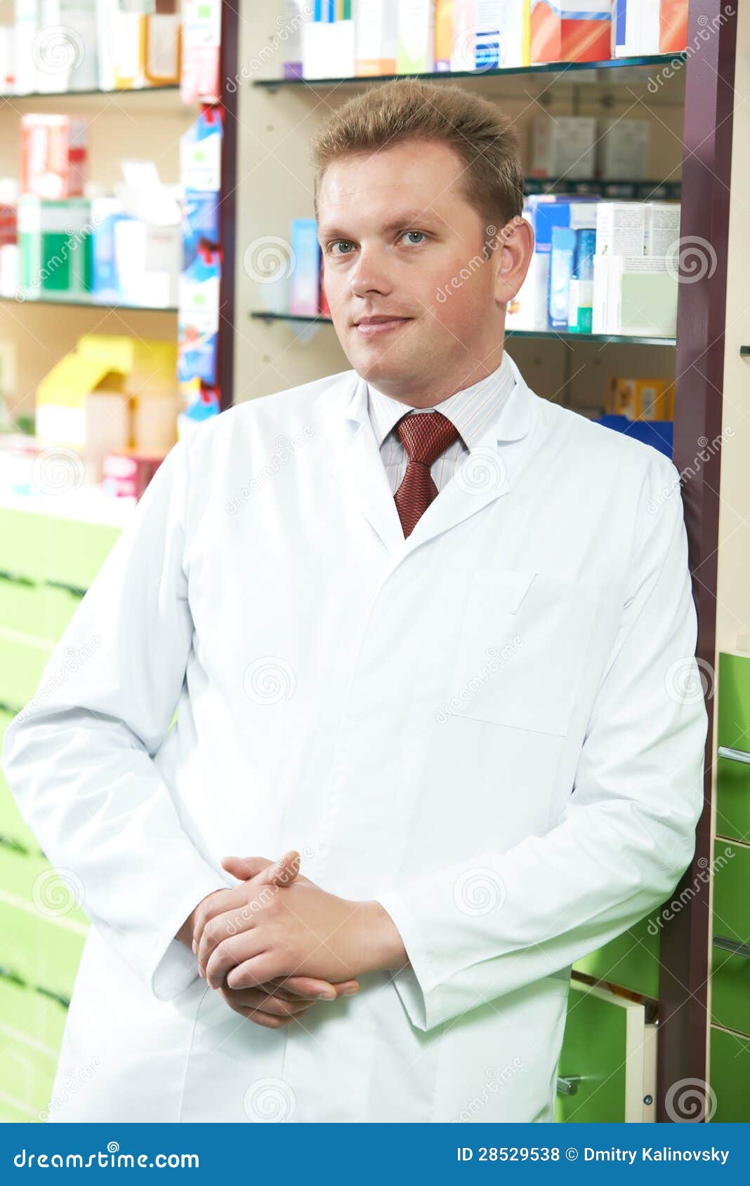 Confident Pharmacy Chemist Man In Drugstore Royalty Free Stock Photos