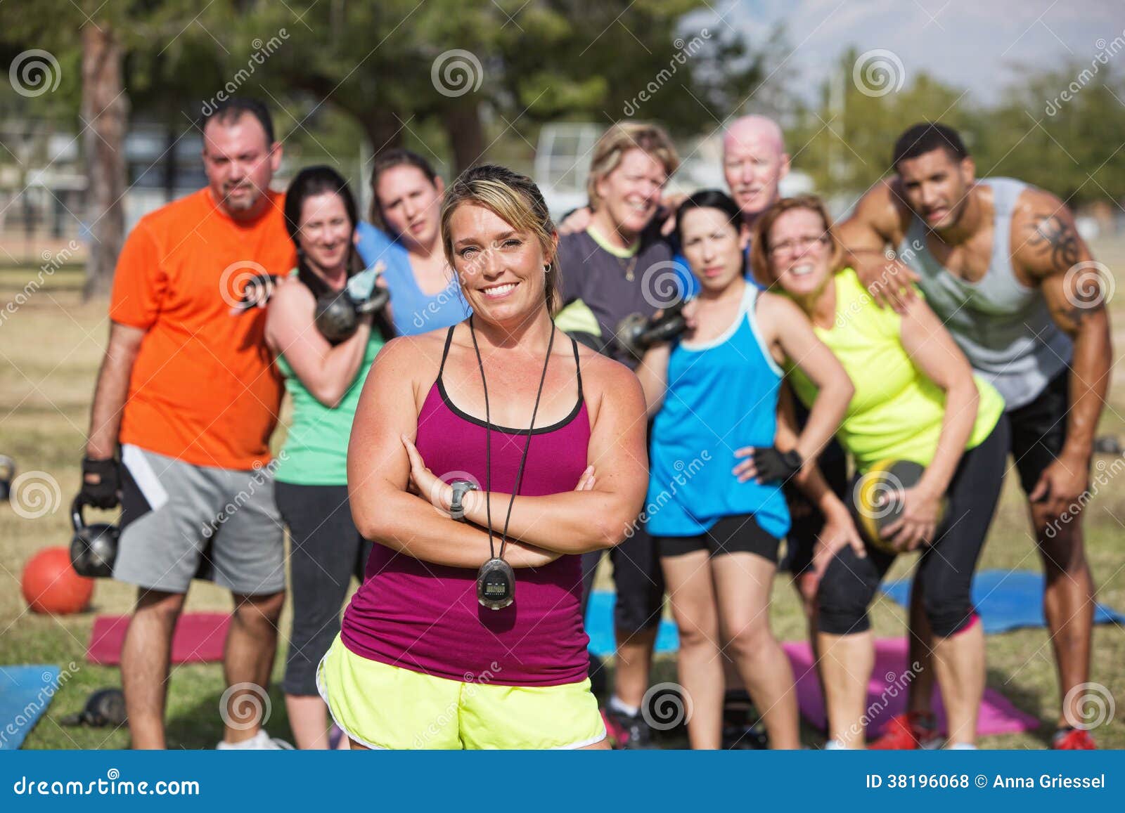 Confident Trainer with Fitness Class Stock Photo Image of outdoors