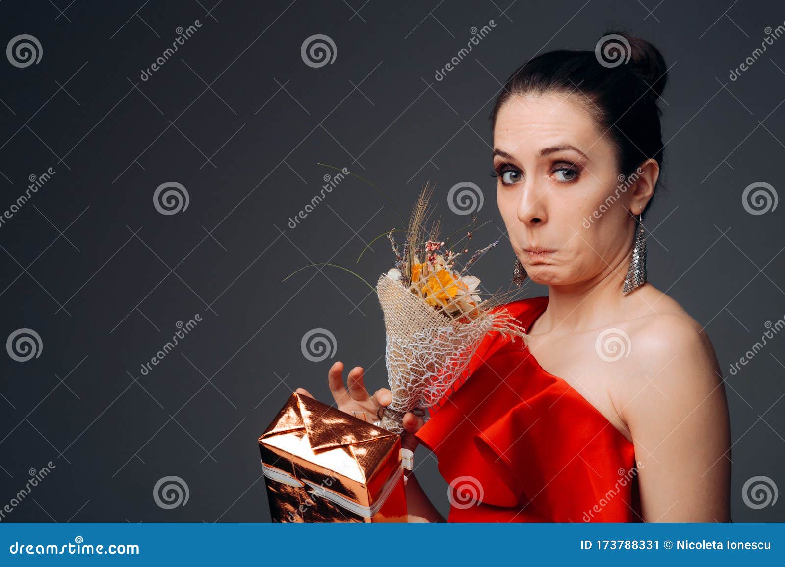 Funny Woman Receiving Bad Gift For Her Anniversary Stock Image