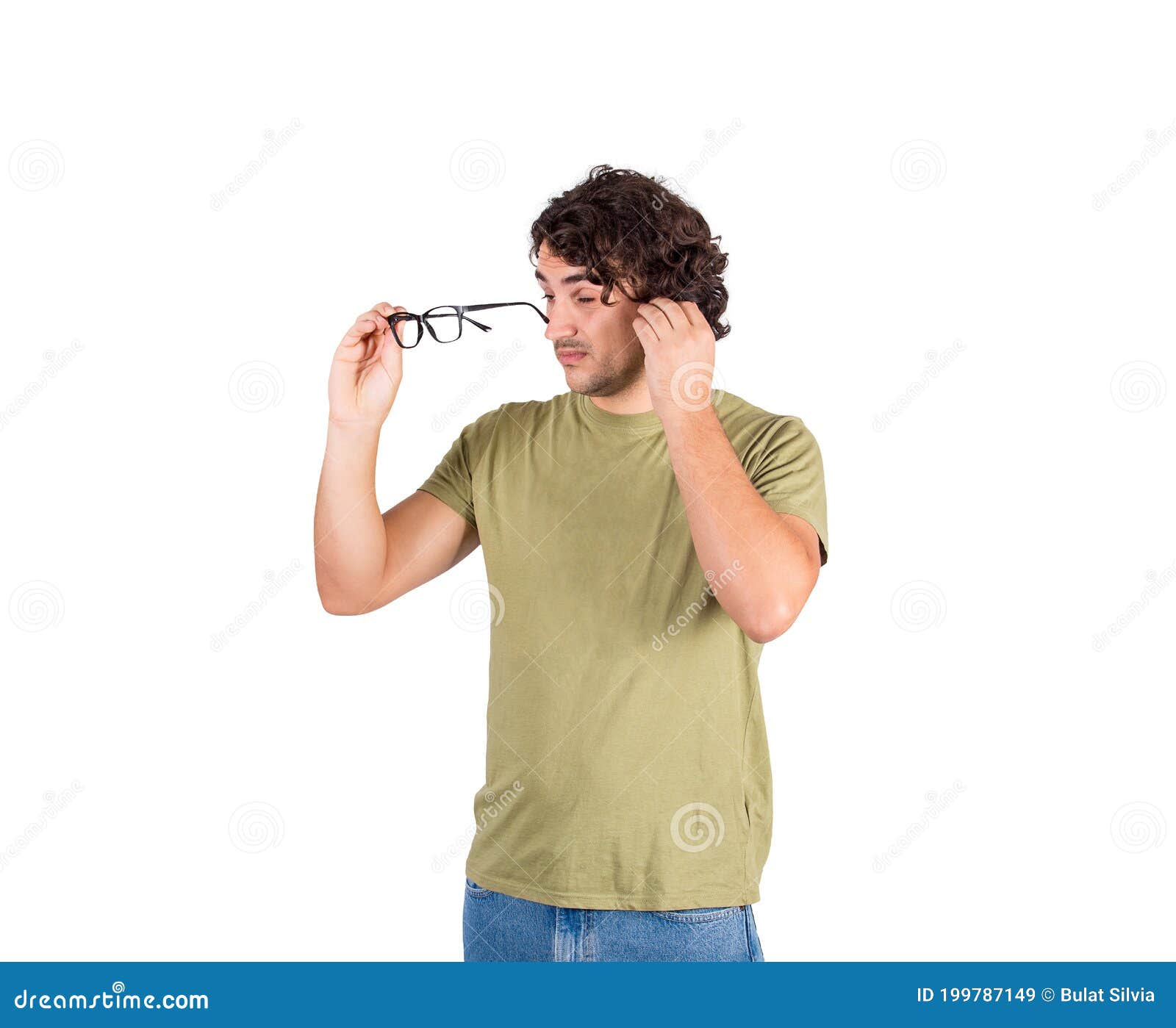 confused young man fixing glasses, trying to look through lenses, poor sight farsightedness, myopia. male eyes problem, suffering