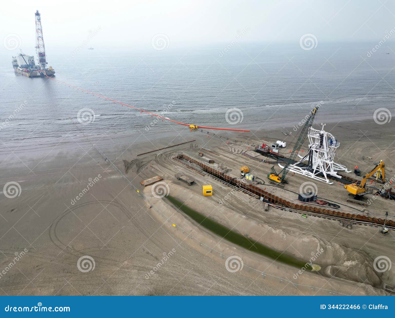 connecting a seacable from a windpark to an onshore power hub