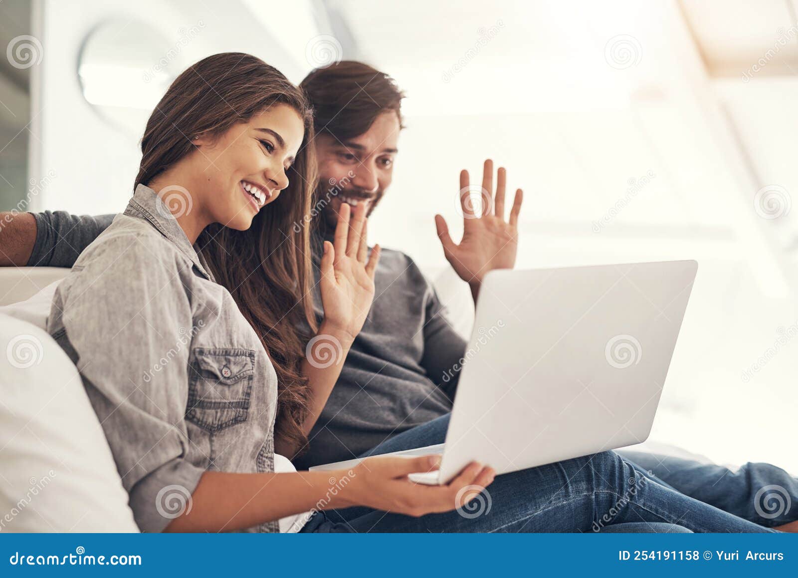 Connecting To Loved Ones Around the World. an Attractive Young Couple