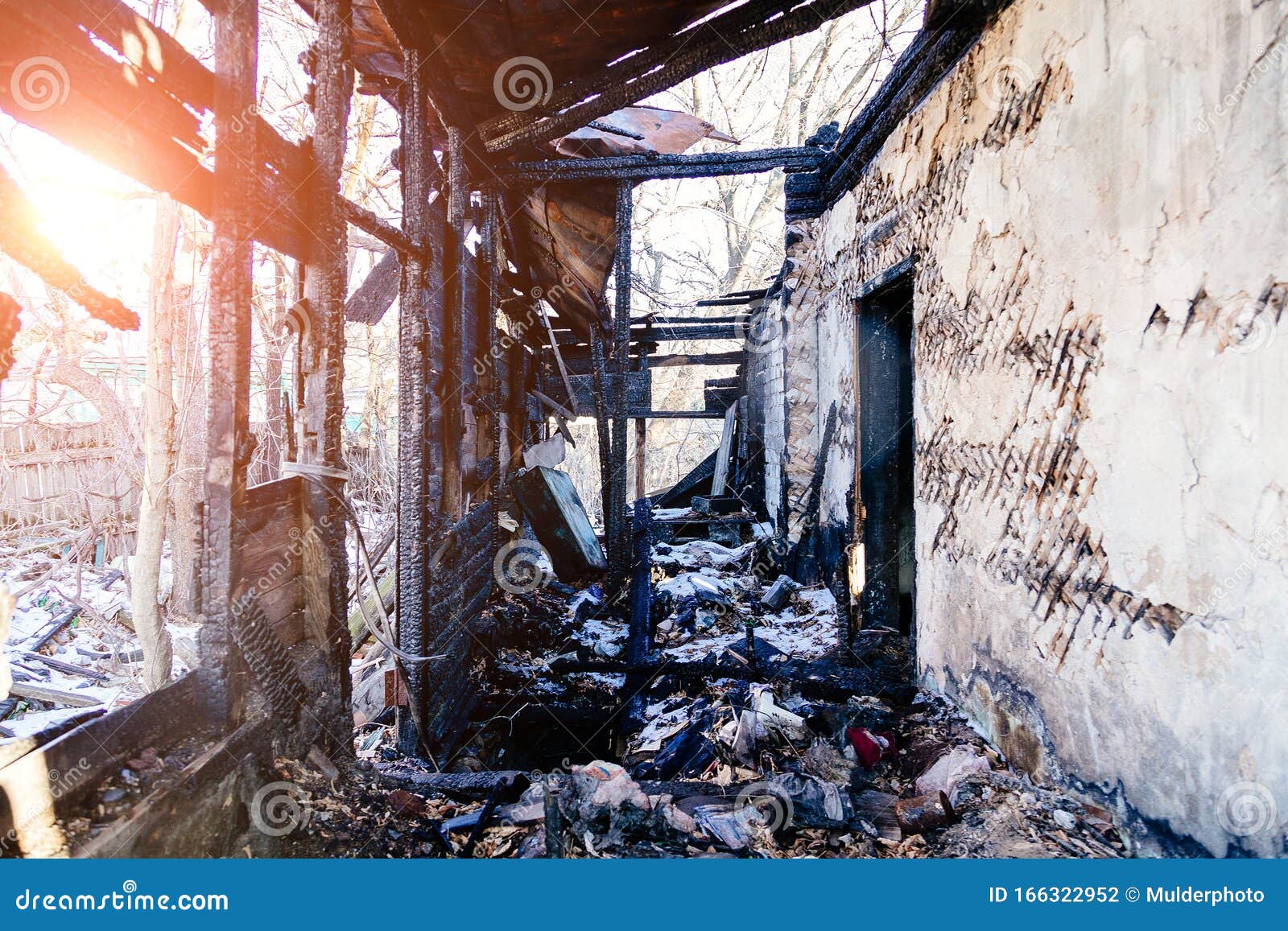 Consequences of Fire. Completely Burnt Old Rural House Stock Photo