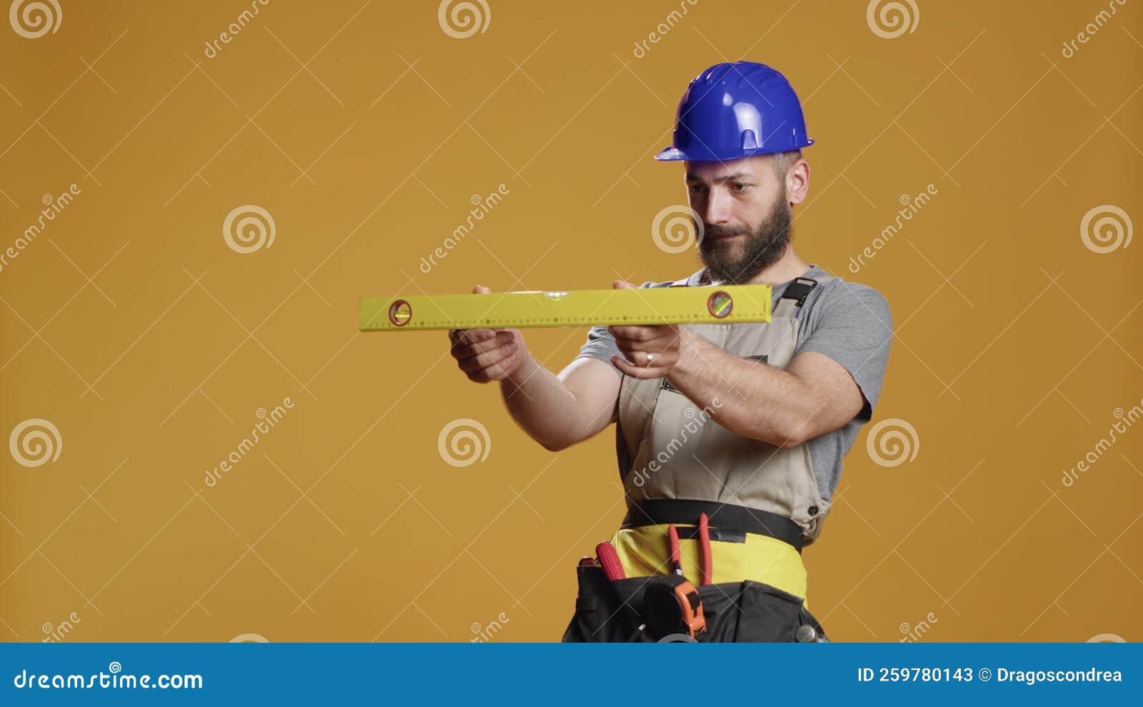 Construction Builder Working with Water Level Tool To Do Measurement