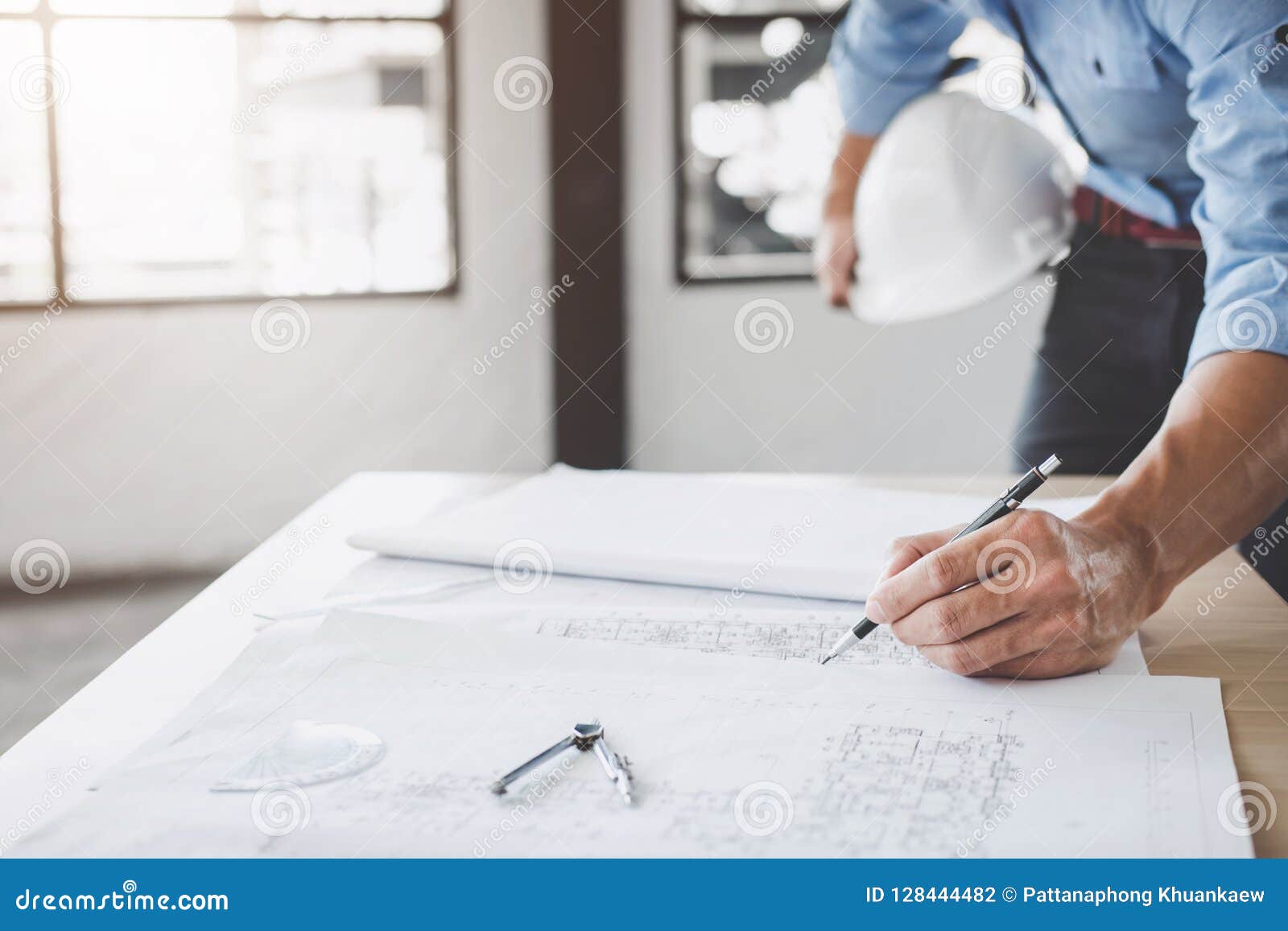 Construction Concept, Hands of Architect or Engineer Working for Stock