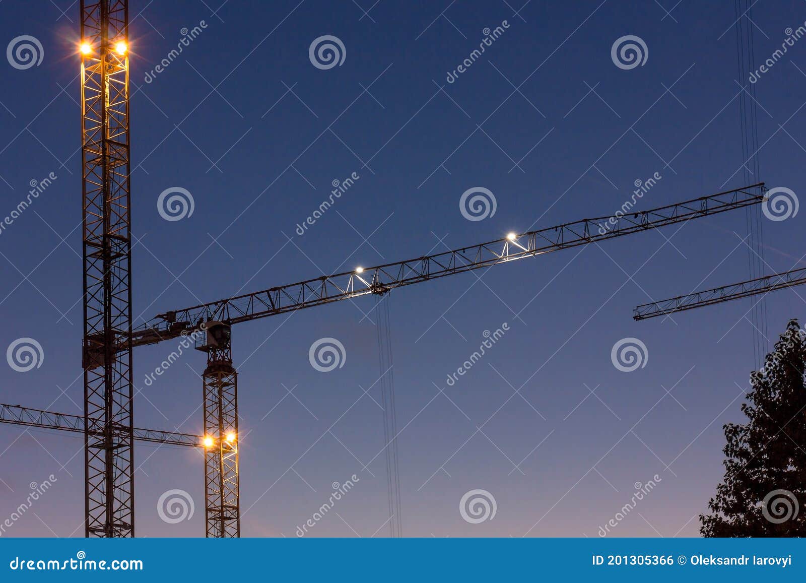 Construction Crane in the City while Working in New Buildings. Stock