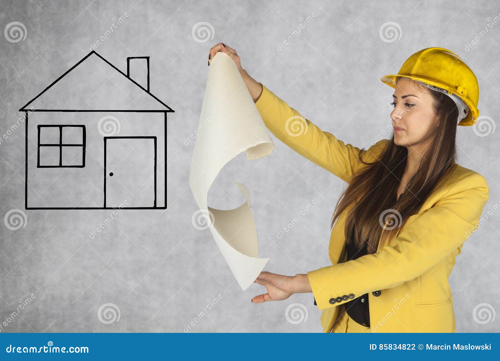 Construction Engineer Looks at a House Plan Stock Photo Image of