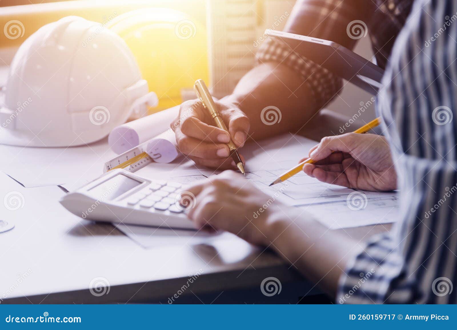 Construction Engineer Working at Blueprint To Build Large Commercial