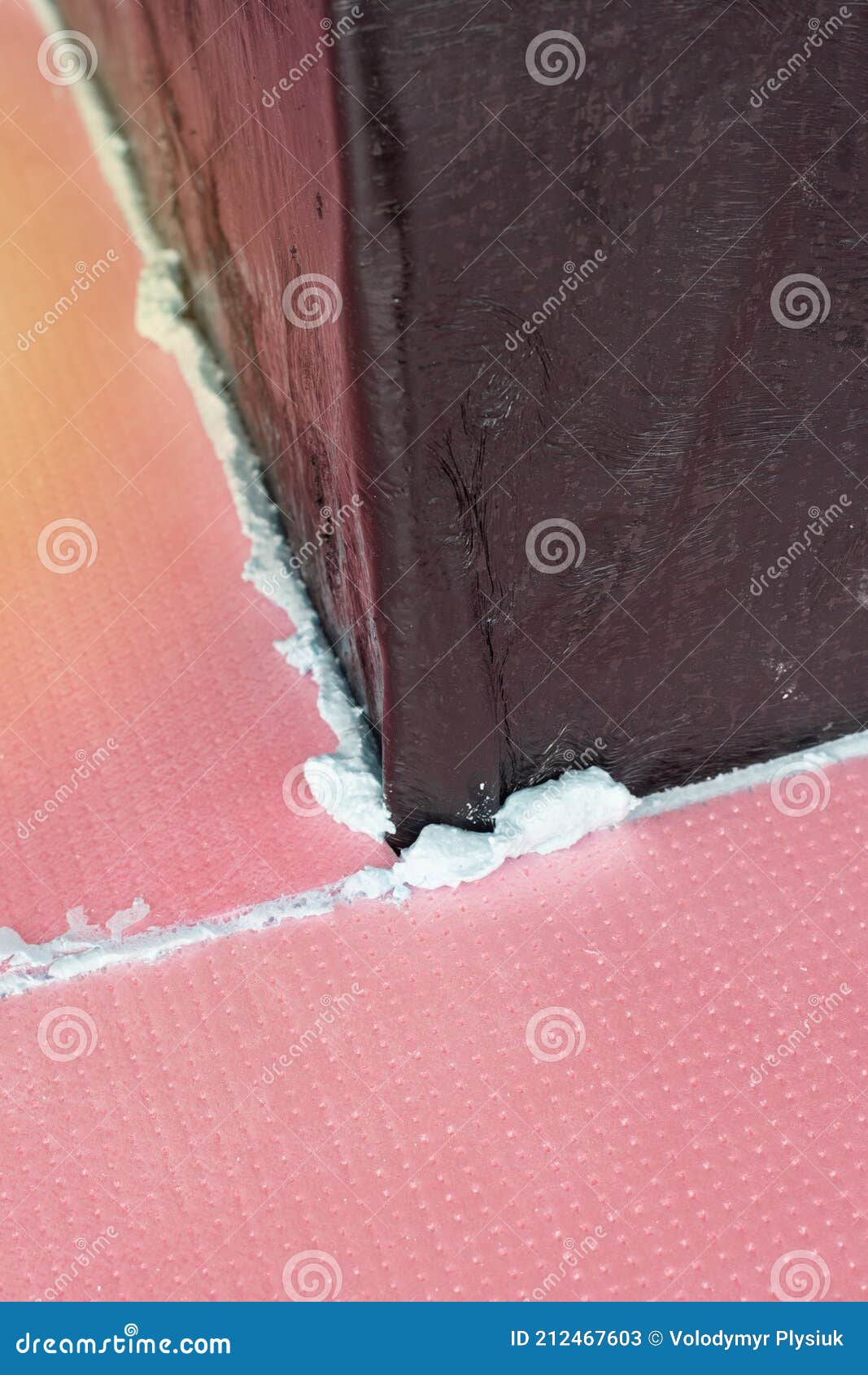 Construction Foam between Pink Extruded Styrofoam Sheets Stock Image