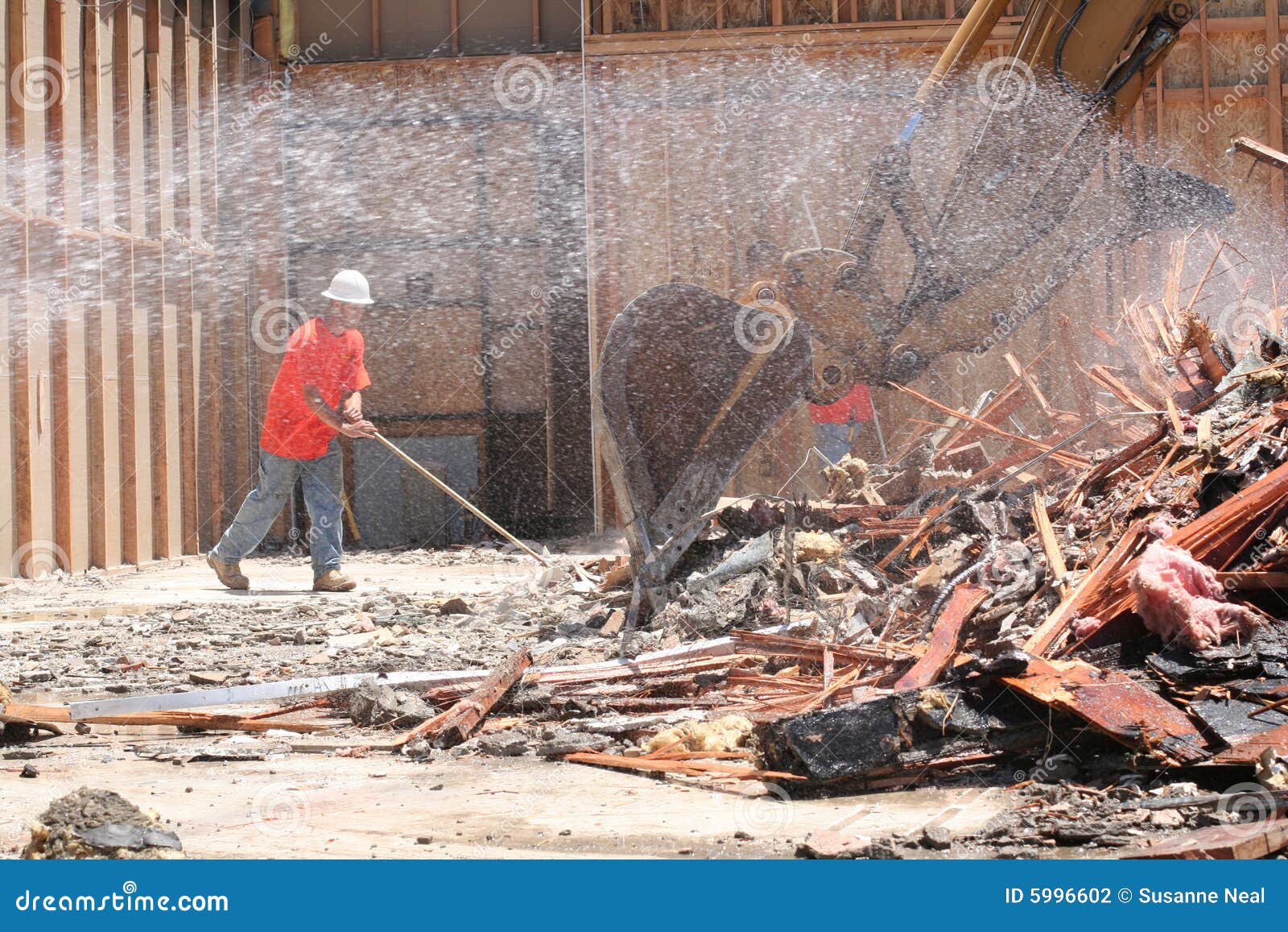 construction laborer sweeping