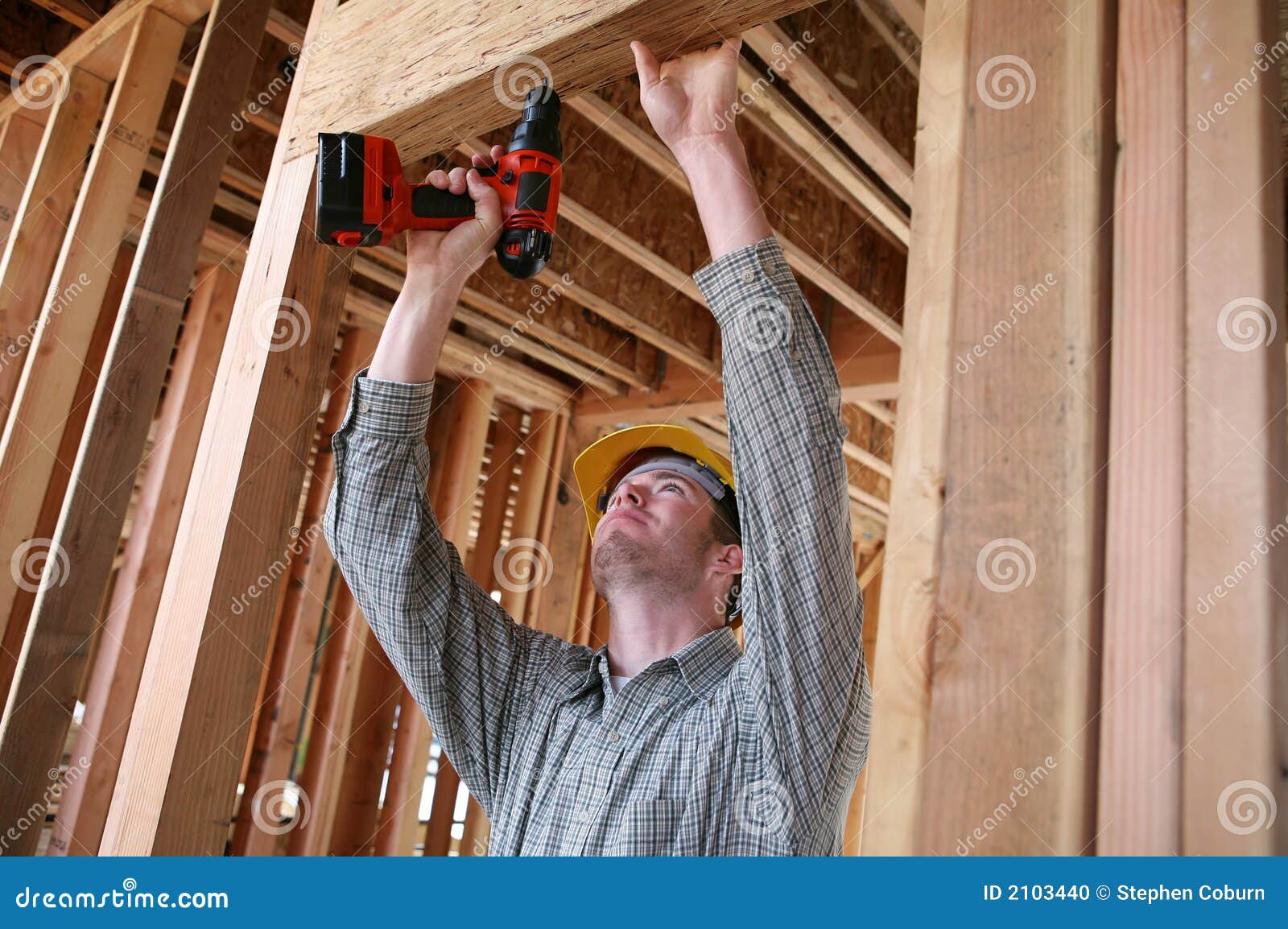 construction man using drill