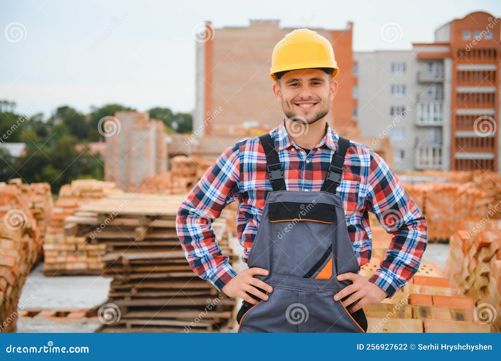 Construction Mason Worker Bricklayer Installing Red Brick with Trowel