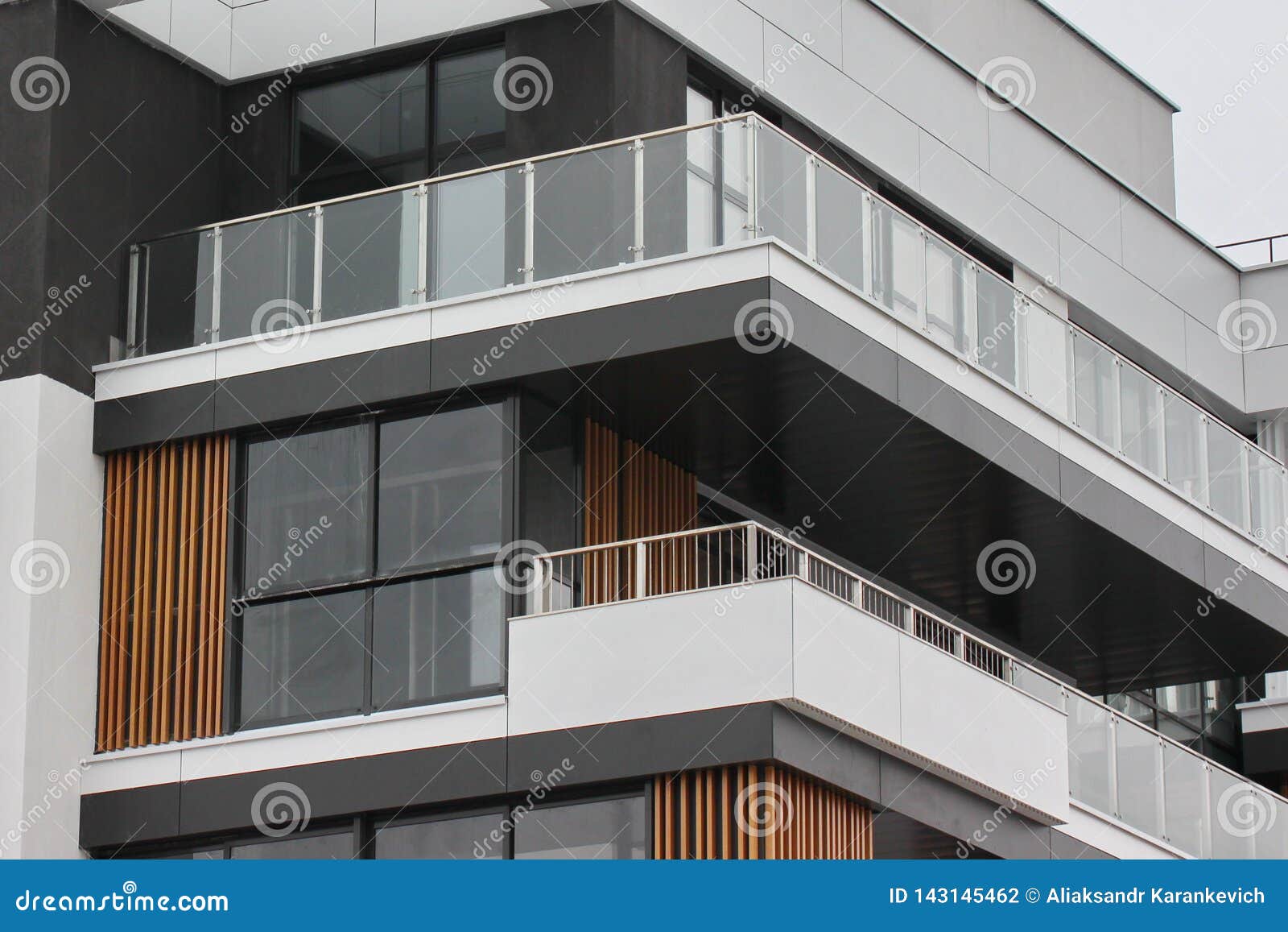 Construction of modern residential buildings. the combination of different materials and textures in the design. convenient layout. Construction of modern residential buildings. combination of different materials and textures in the design. convenient layout of apartments and houses. low-rise buildings. glass, wood, metal and concrete are stylish solutions