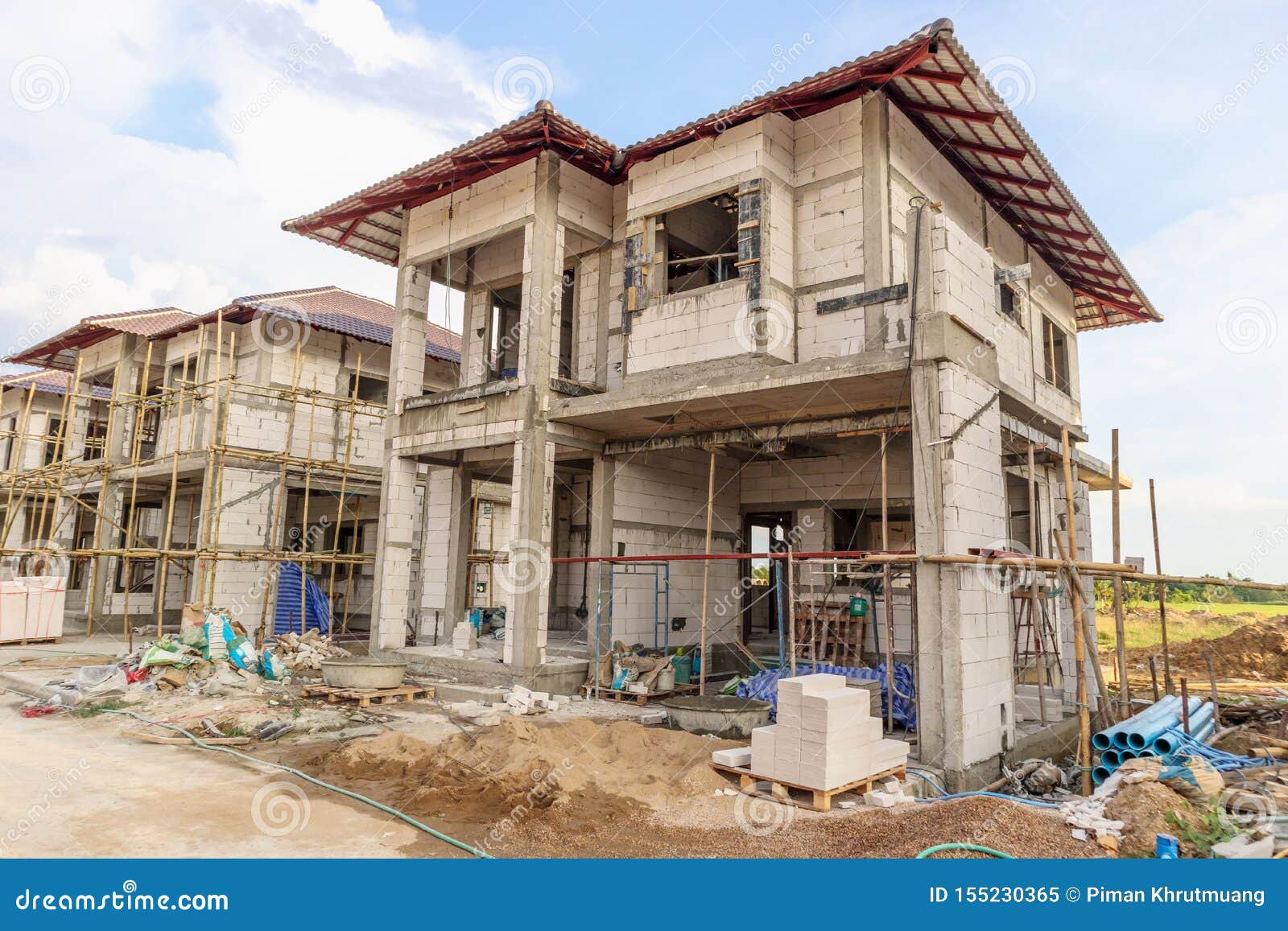 Construction Residential New House In Progress At Building Site Stock