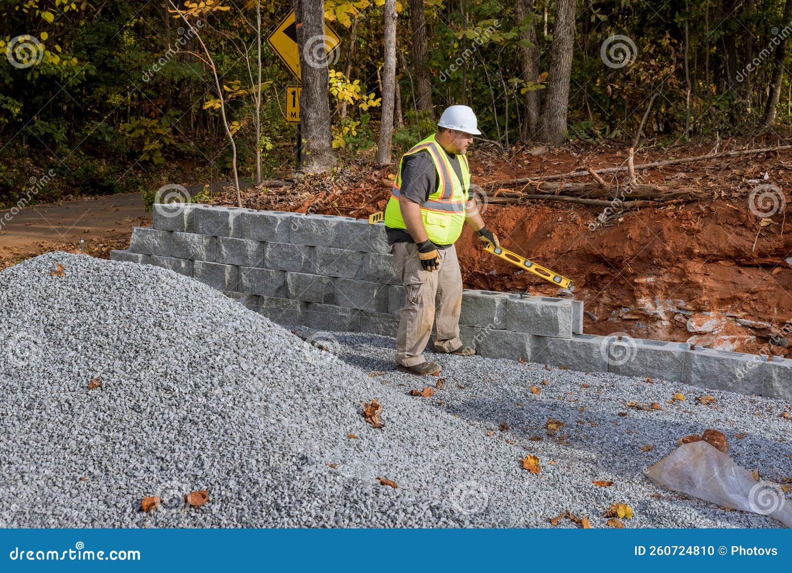 During the Construction of a Retaining Wall on a New Property, a