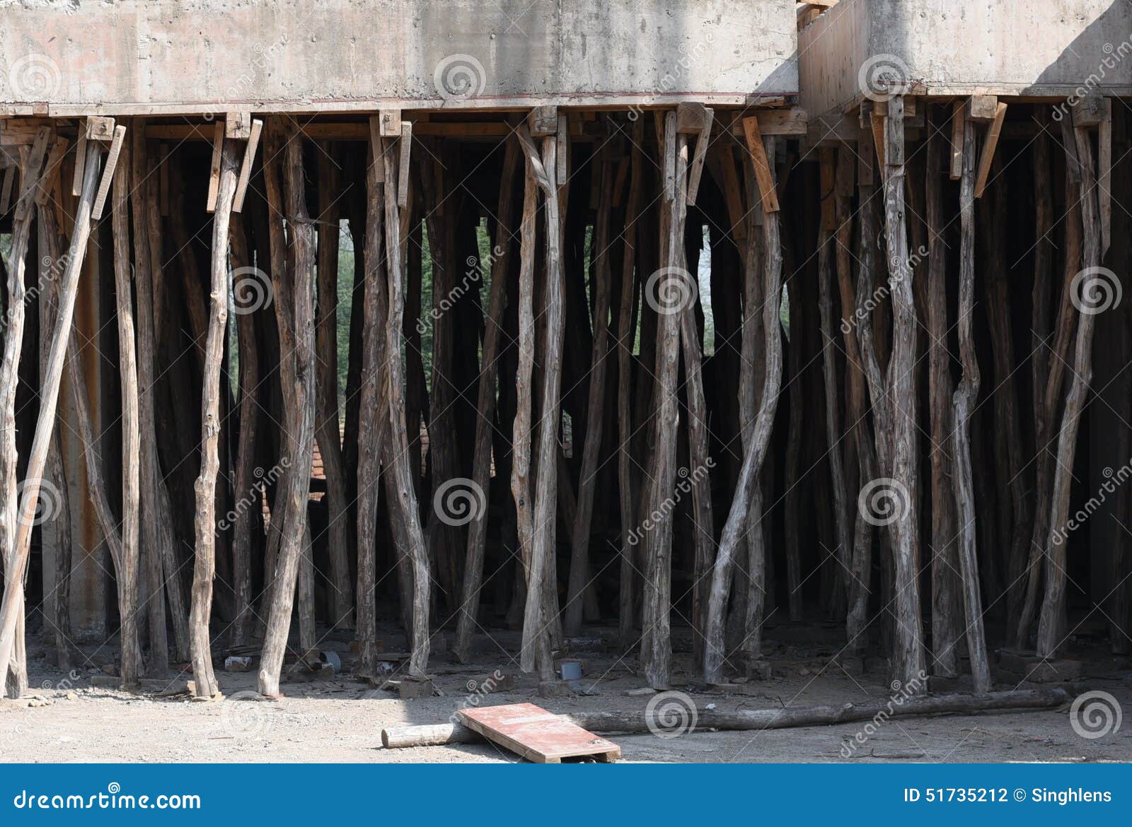 Construction Site with Bamboo Sticks To Support Concrete Roof Stock