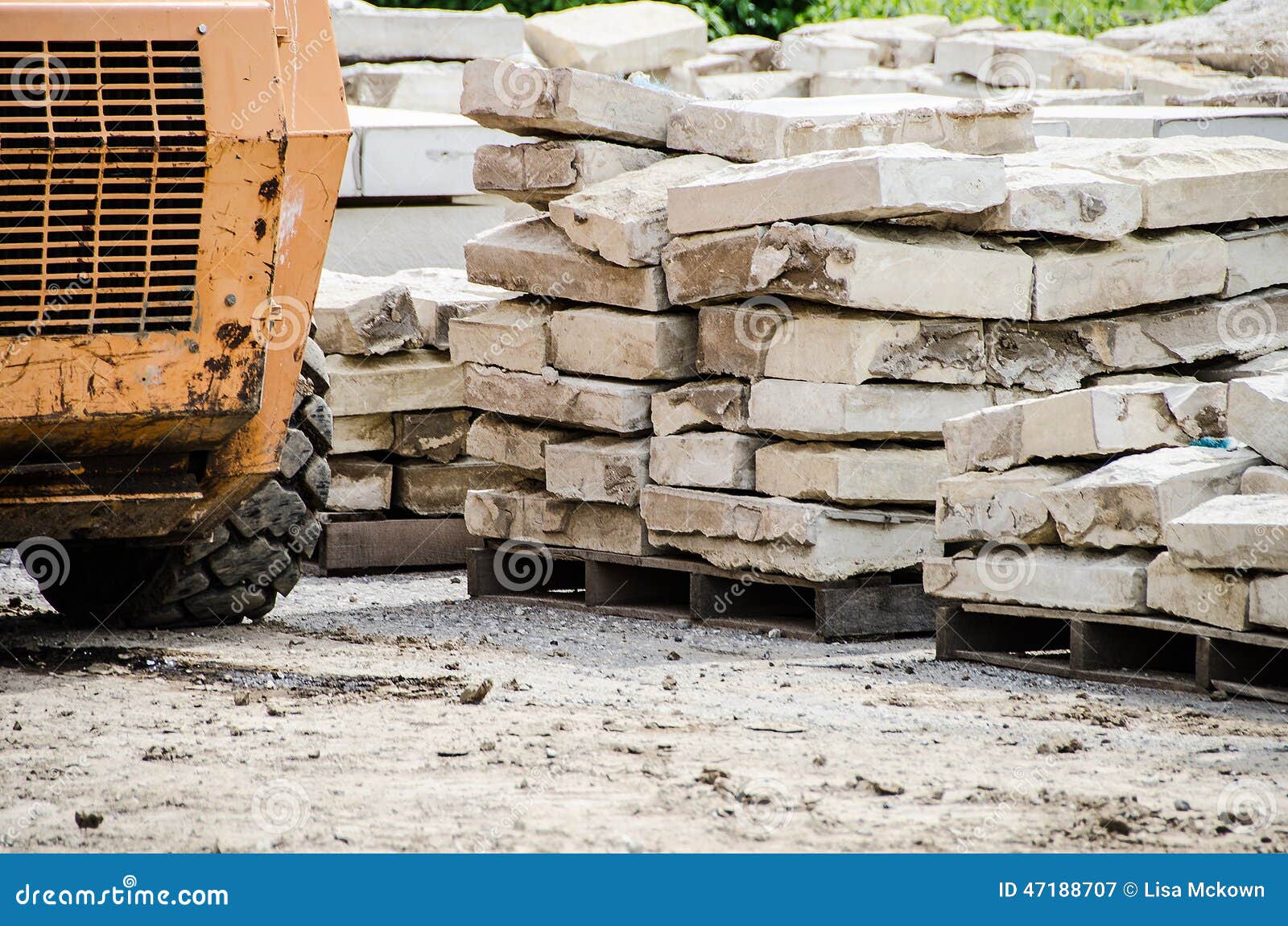 construction-site-building-materials-equipment-stack-building-stone-blocks-47188707.jpg