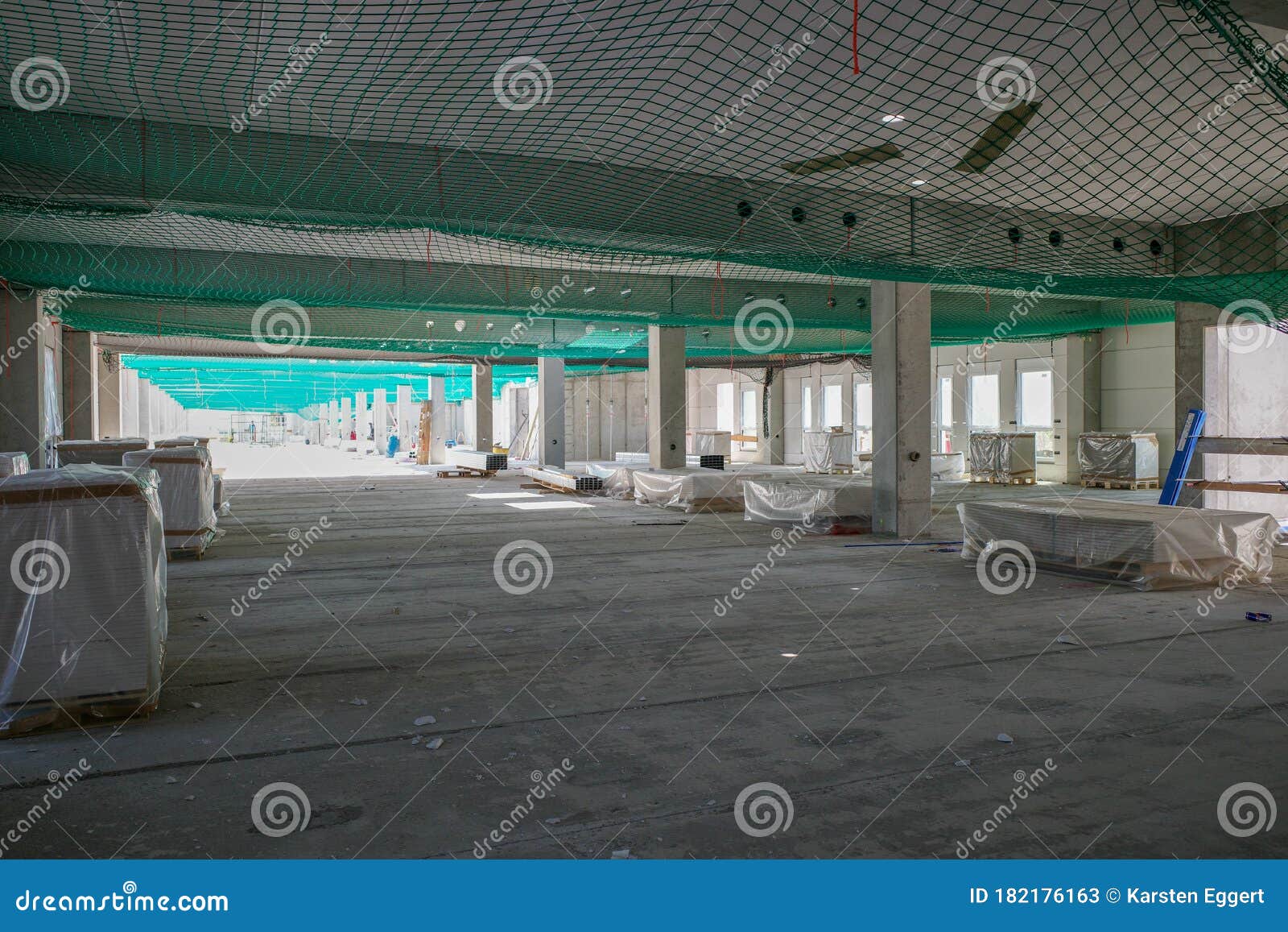 On Construction Site the Interior Finishing of a Factory Building Takes