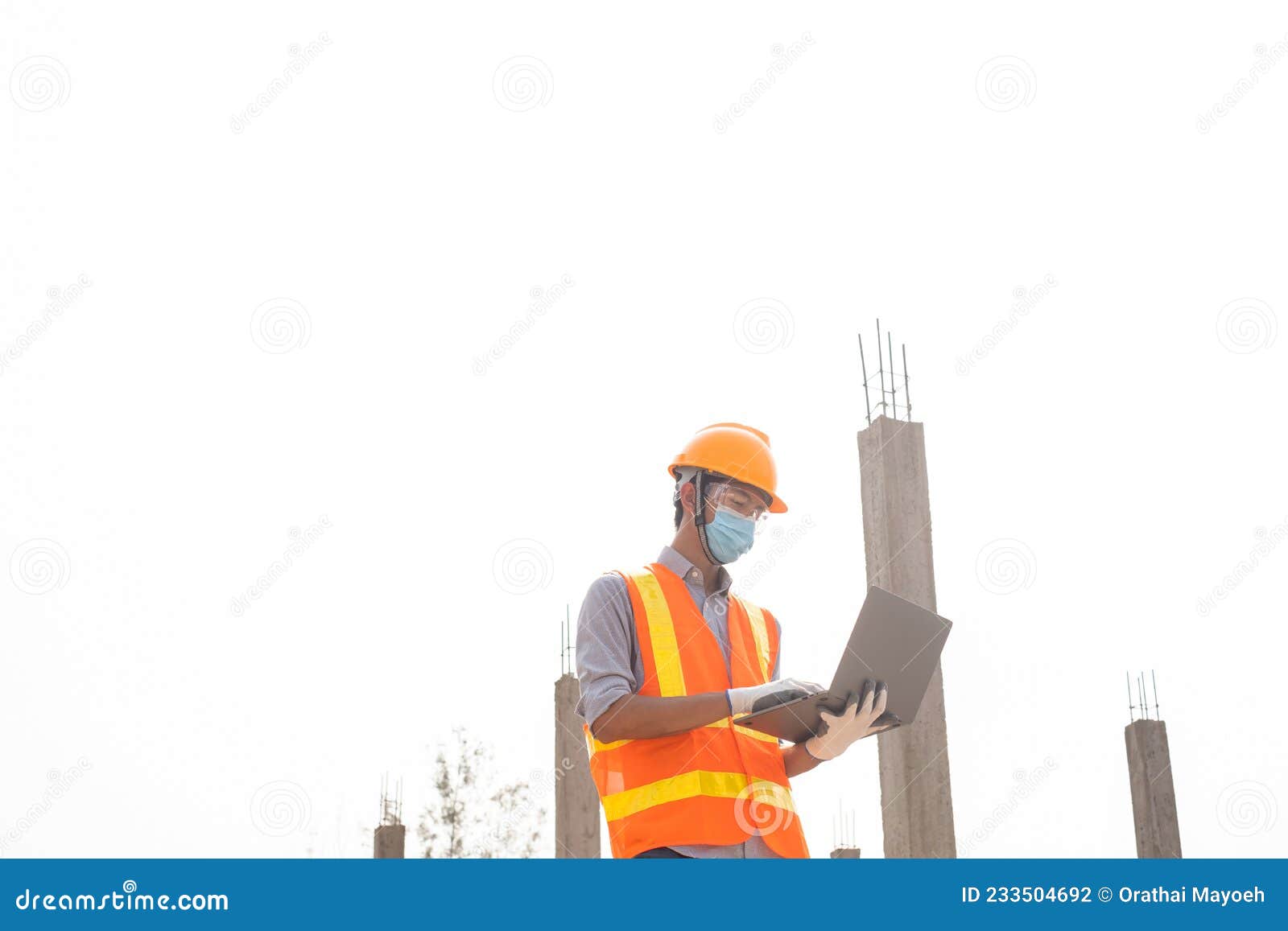 The Construction Site Male Engineer or Architect is Exploring and Inspecting the Outdoor