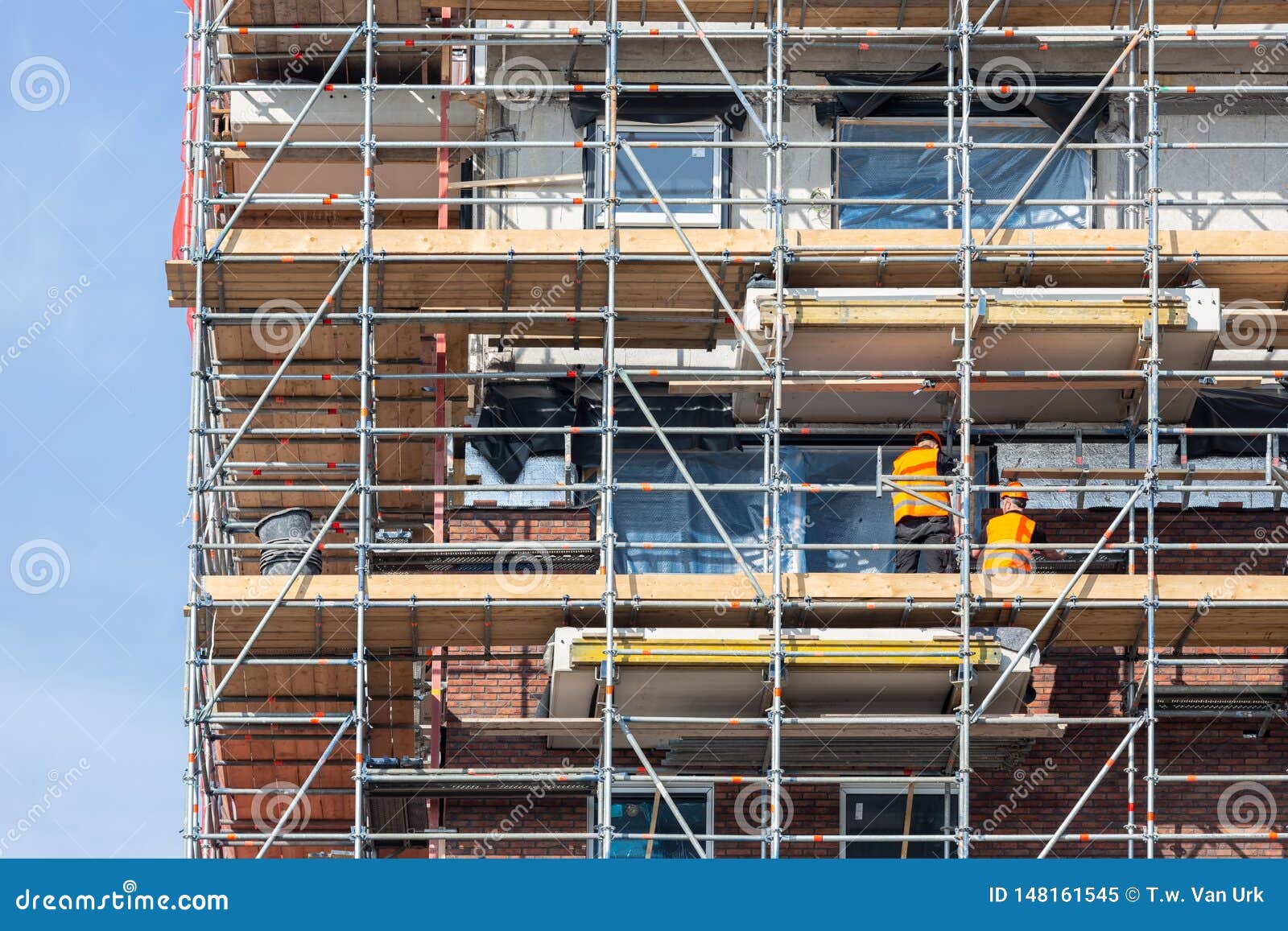 Construction Site New Apartment Building with Scaffolding and Mason Workers Stock Image Image