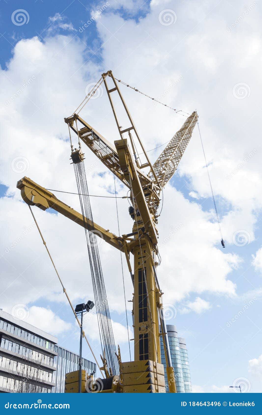 Construction Site with Tower Crane for Lifting Building Materials Stock
