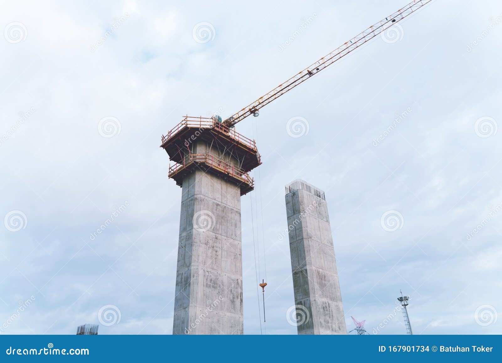 Construction of Tall Concrete Pylon of Bridge Using Tower Stock Photo