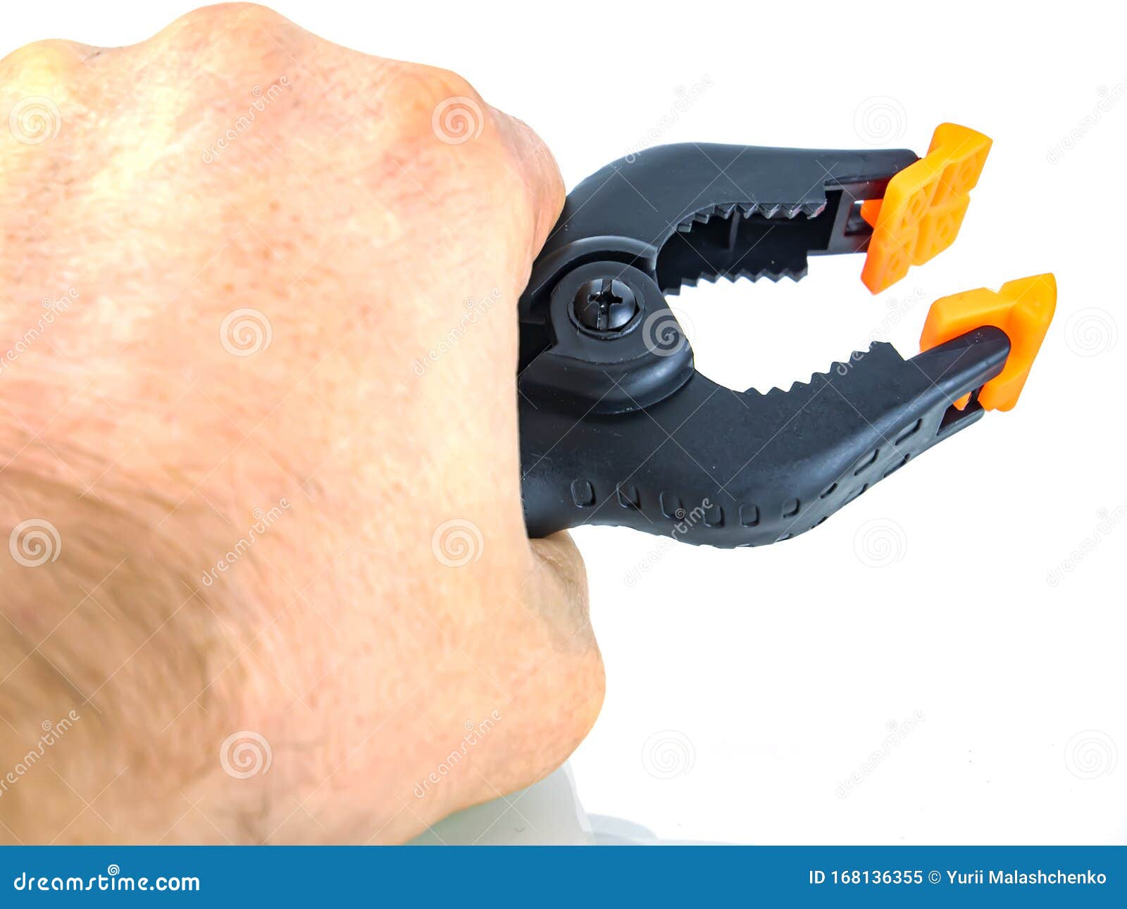 Construction Tool Black Plastic Clothespin on a White Background Stock