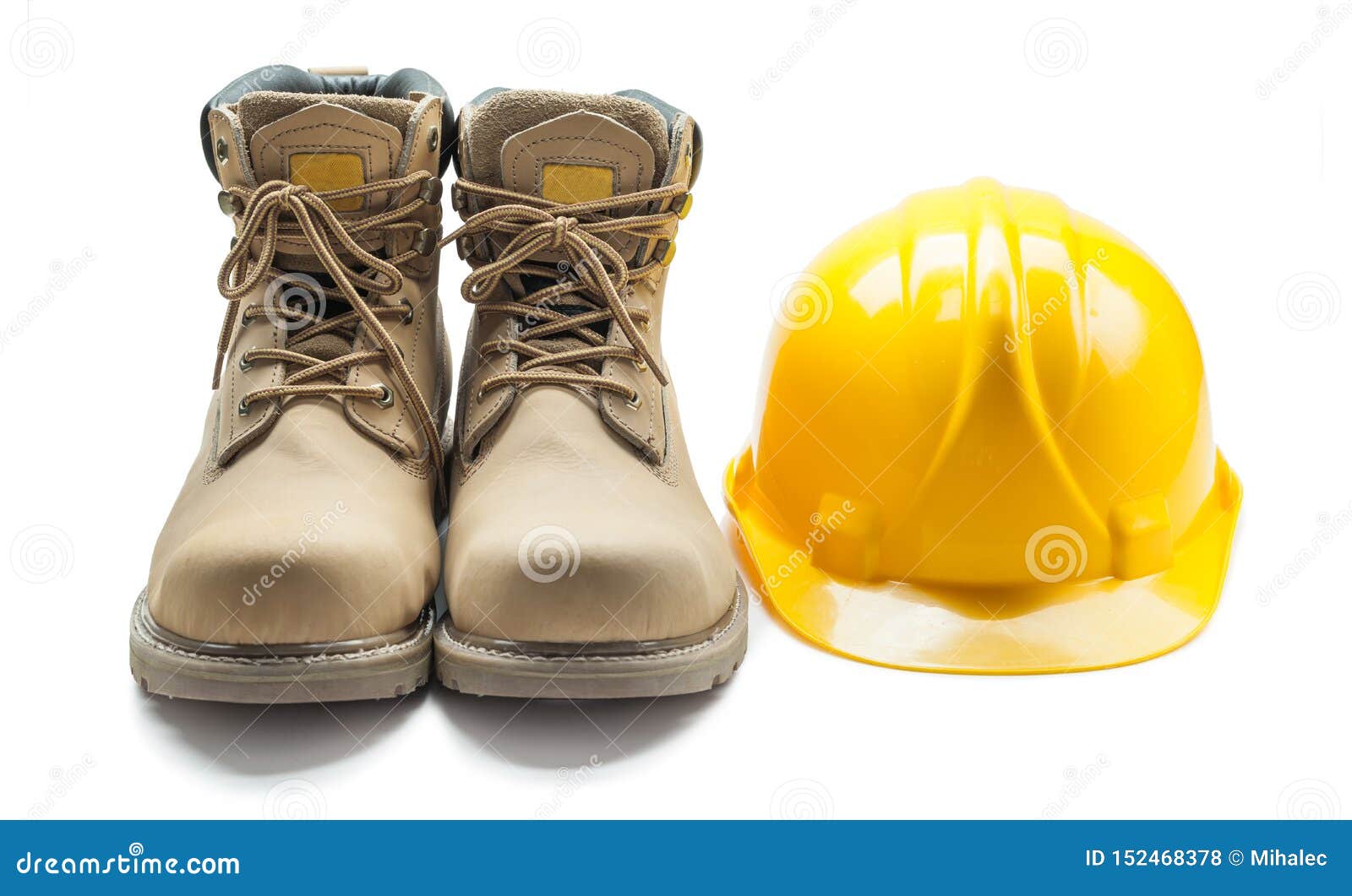 Construction Tools Leather Working Boots and Yellow Helmet Isolated on