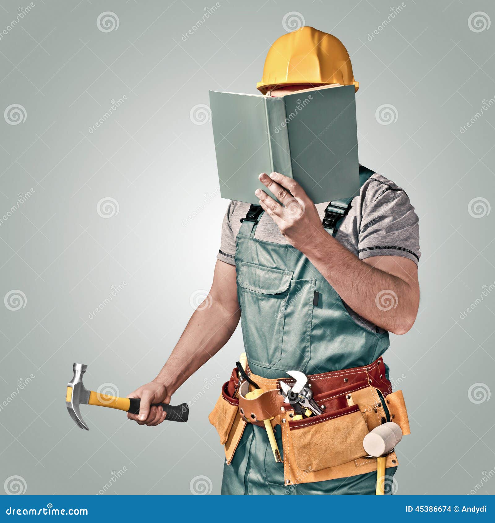 Construction Worker, Builder with a Tool Belt and Book Stock Photo